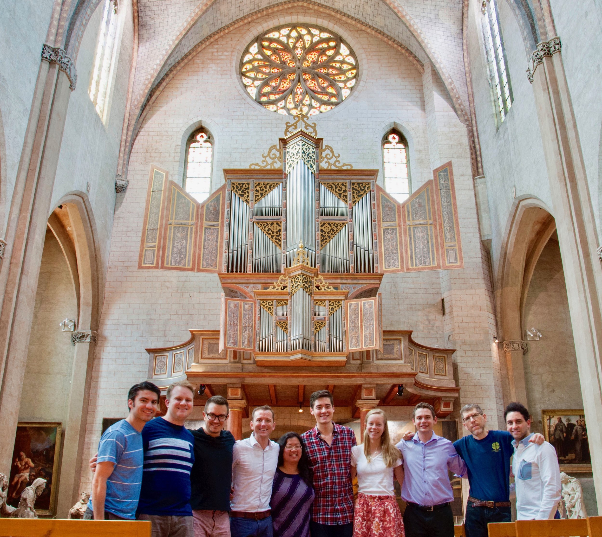 Boston Organ Studio members pose before the Ahrend organ in Toulouse. 
