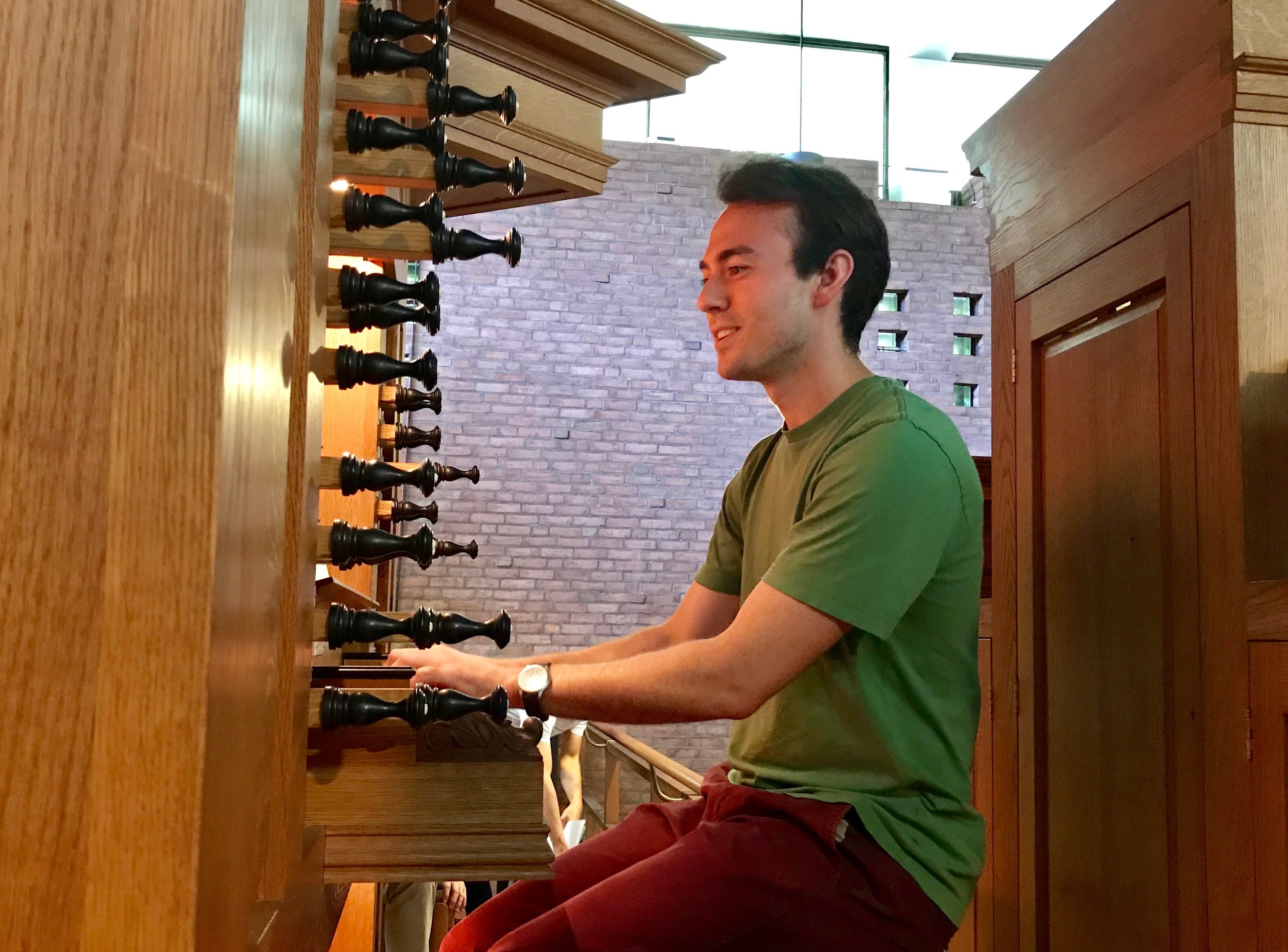  Organist Kade Phillips plays at First Lutheran Church.&nbsp; 