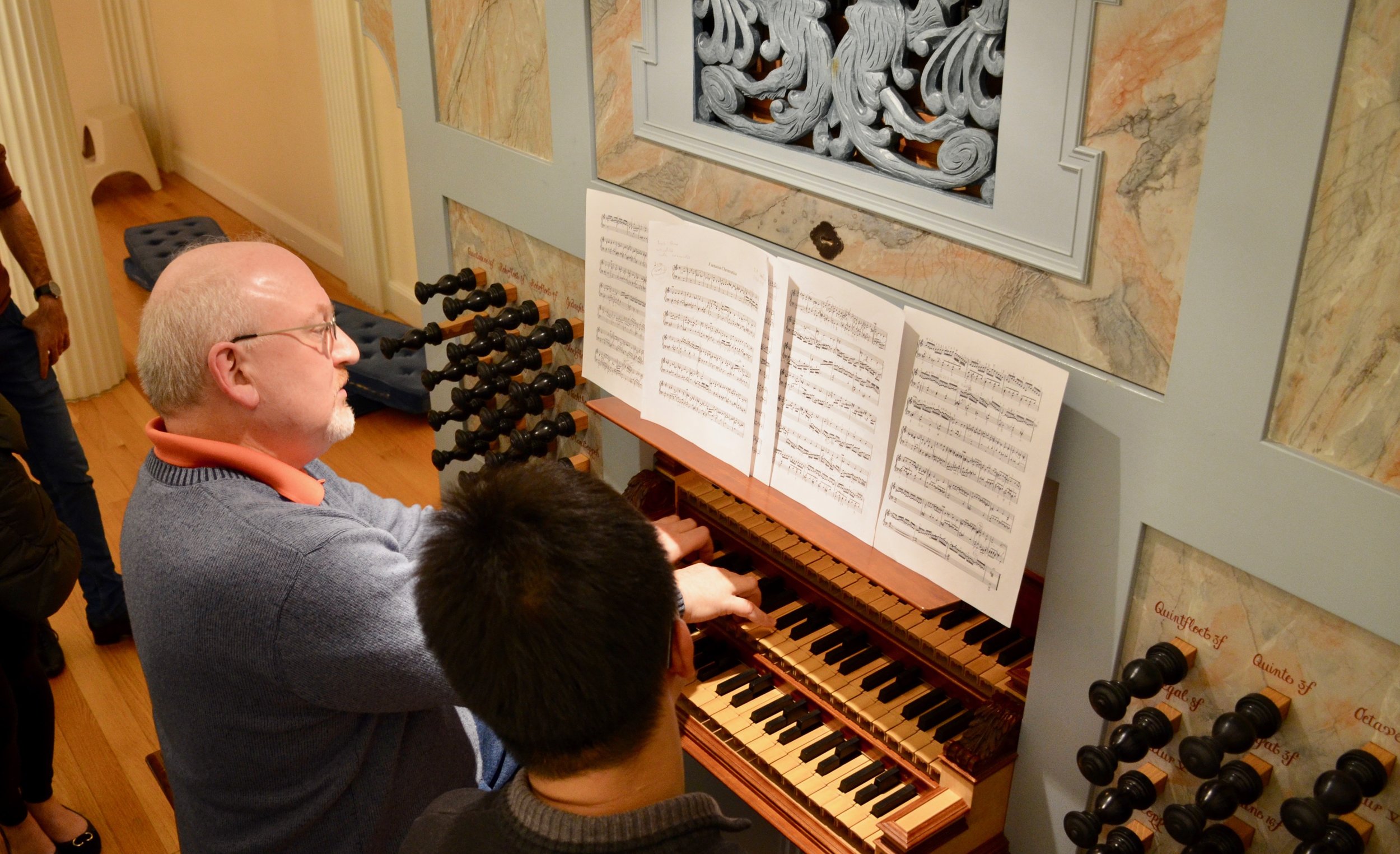 Professor Martin Jean demonstrates for student Adrian Cho
