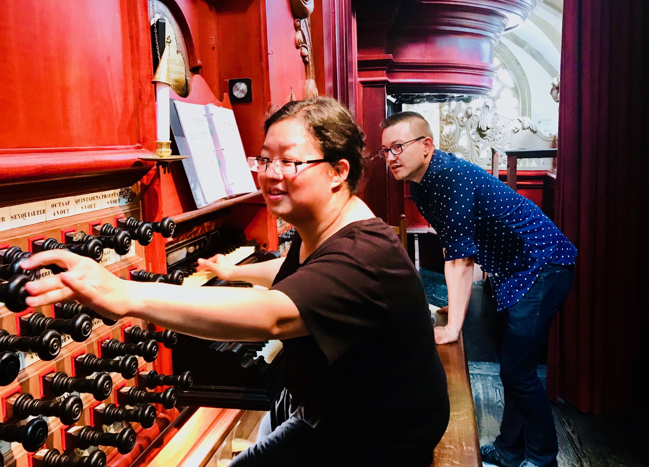  Corey De Tar assists Jennifer Hsiao at the Muller organ in St-Bavo, Haarlem.  