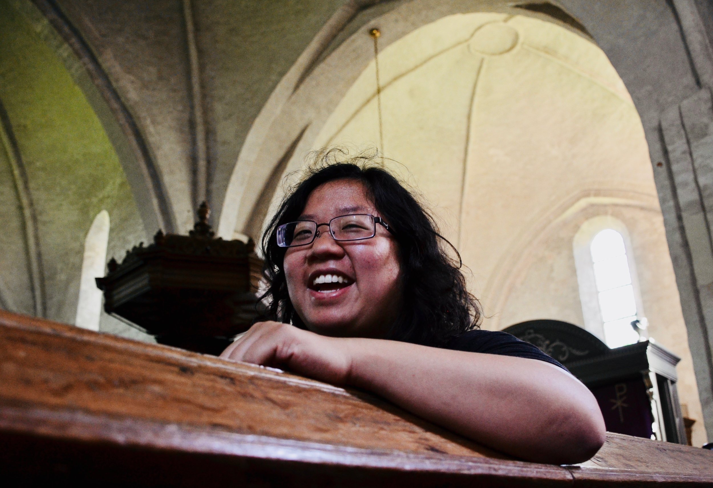  Jennifer Hsiao is all smiles listening to the 1733 Hinsz organ, Leens, Holland. 