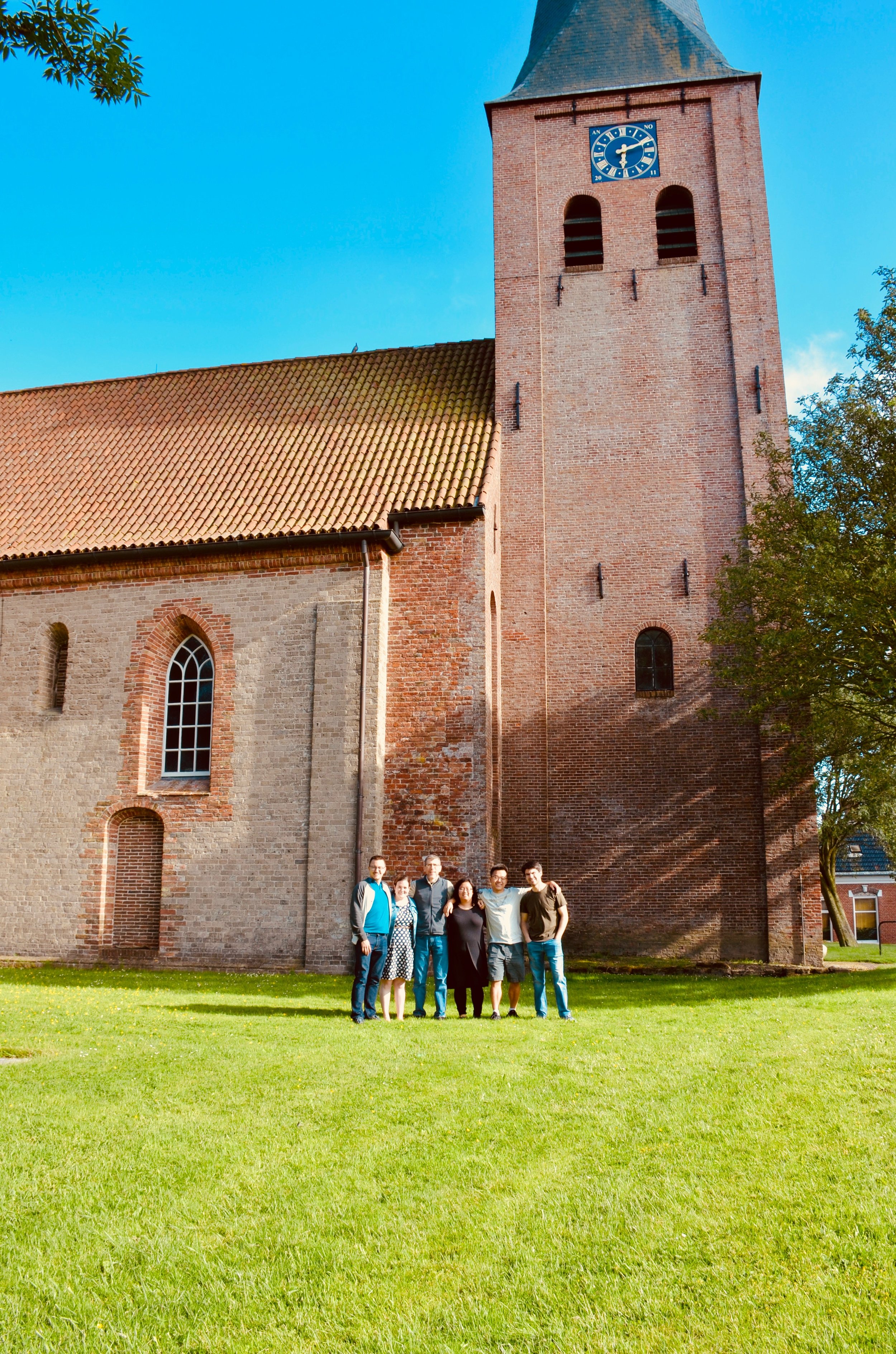 Members of Boston Organ Studio outside Petruskerk, Leens, Holland.