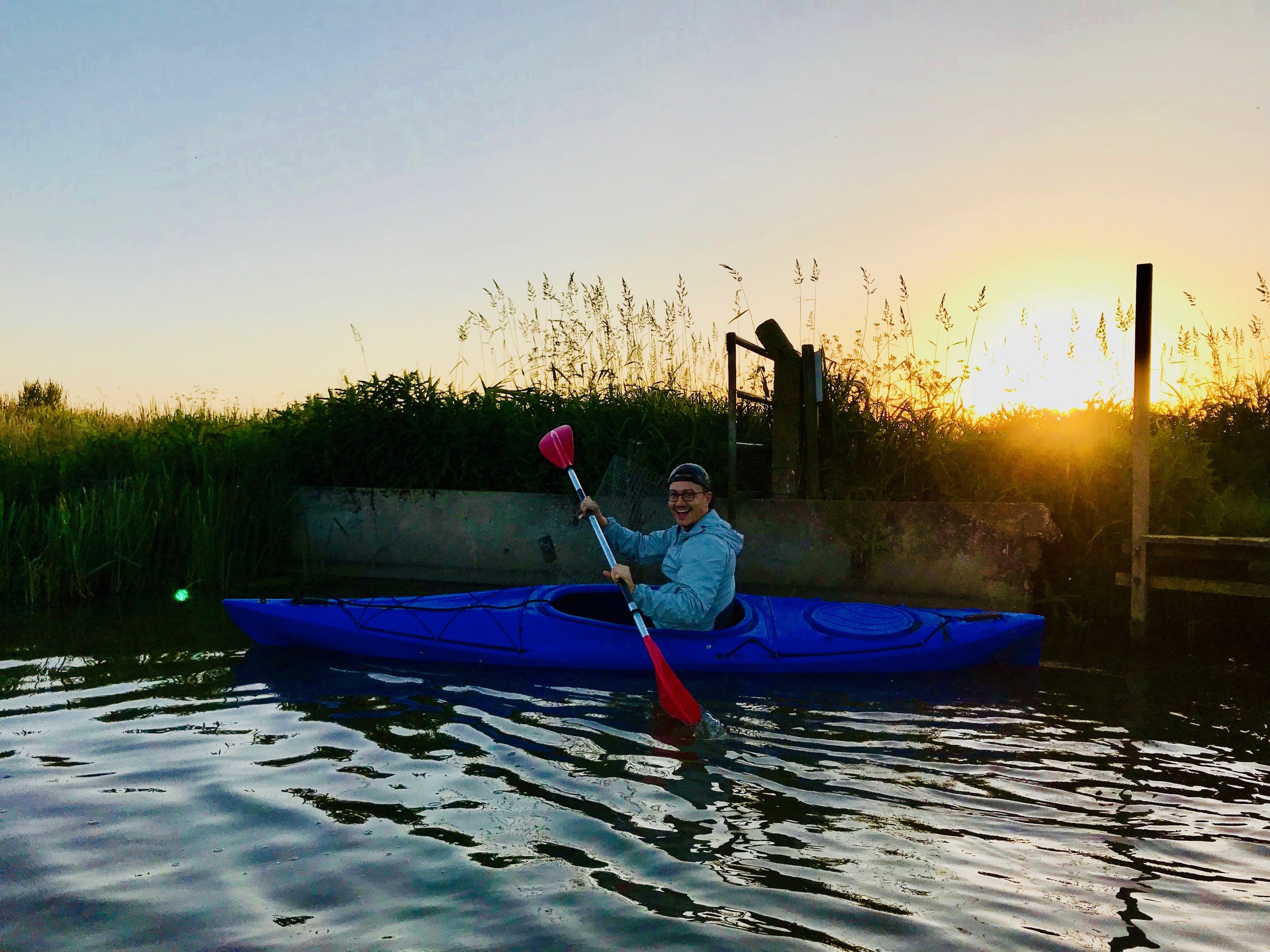 Corey De Tar kayaking at our Airbnb in Holland!