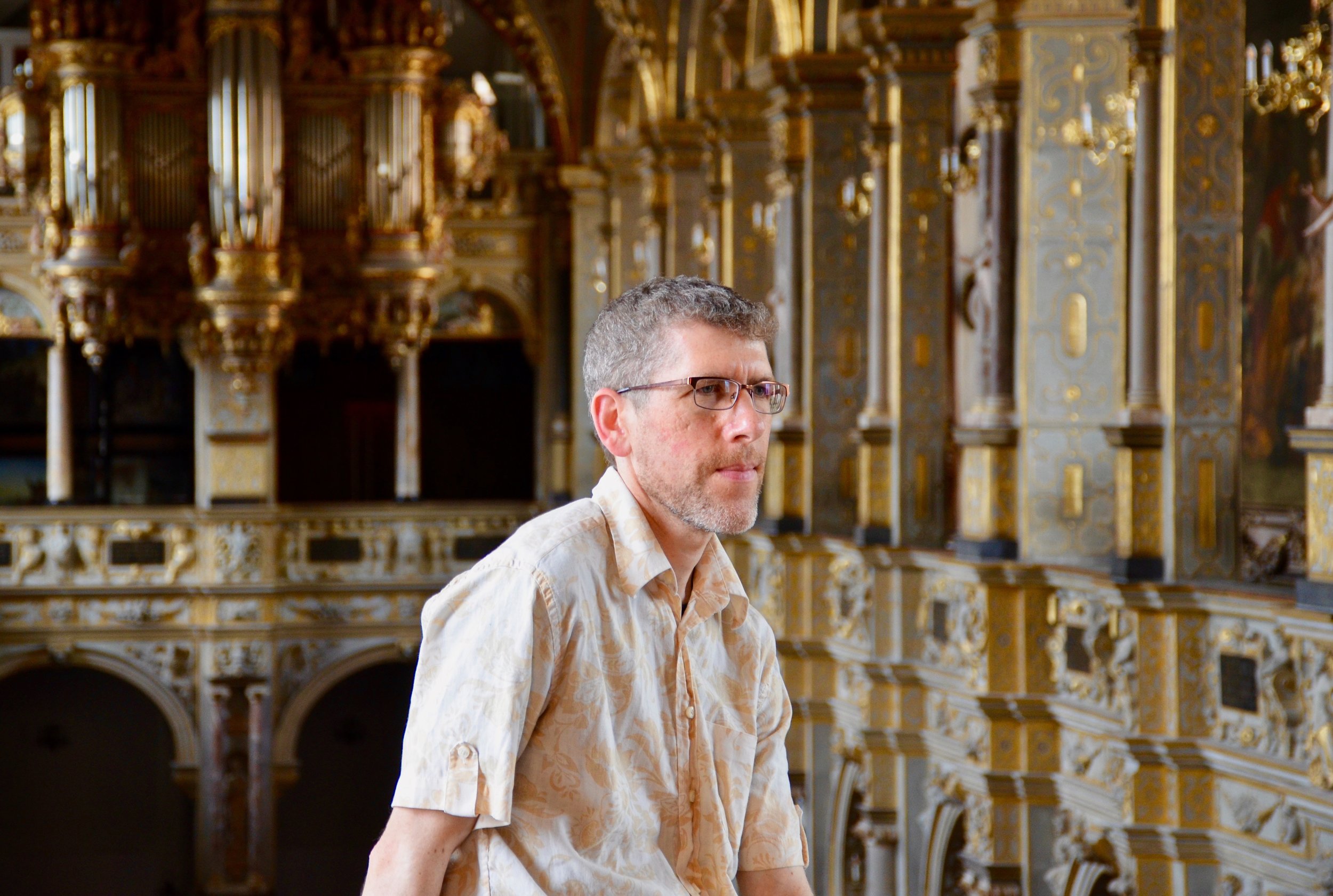 Chris Porter listens to the 1610 Compenius organ, Frederiksborg Castle, Hillerød, Denmark.