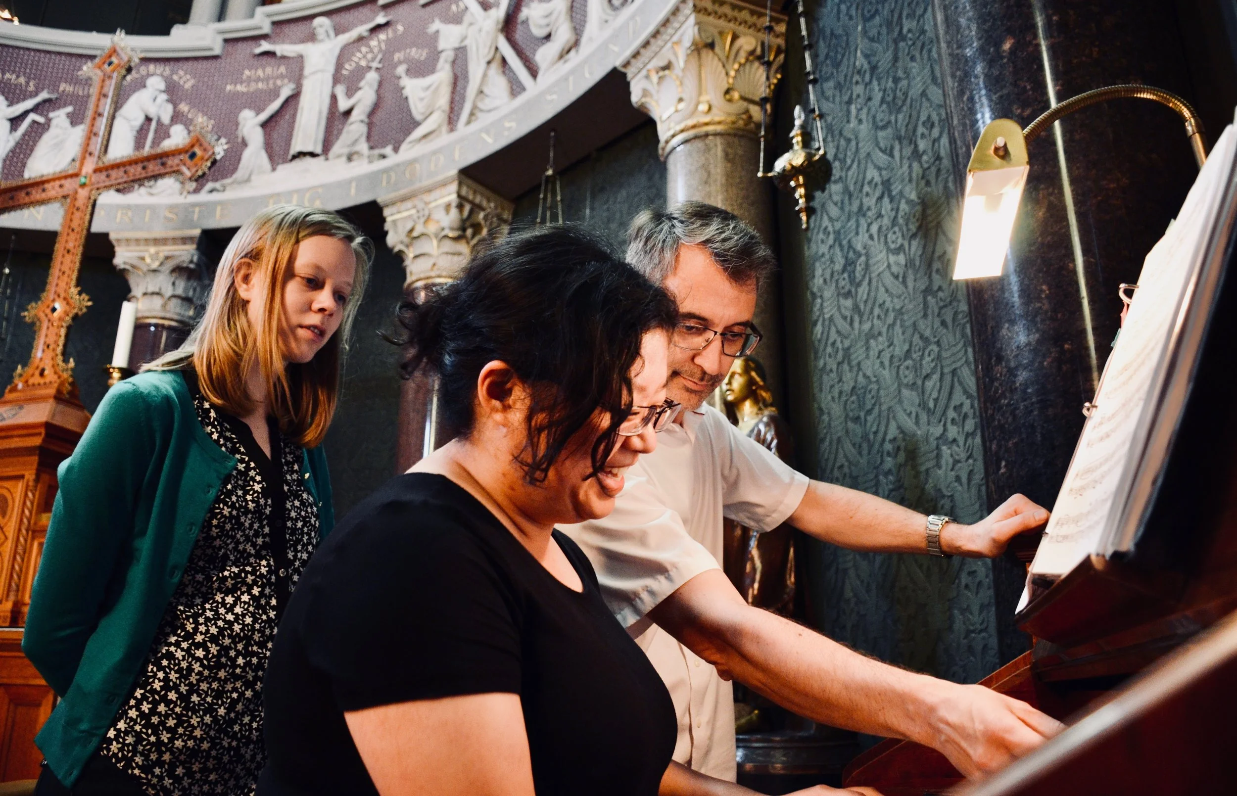 Sven Verner Olsen assists Jennifer Hsiao at the harmonium, Jesuskirke, Copenhagen.