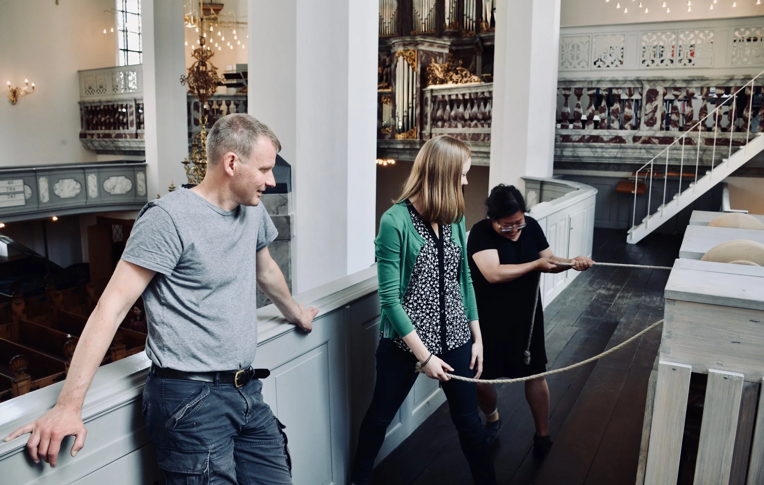 Jennifer Hsiao pumps the bellows for the Italian baroque organ in Trinitatis Kirke, Copenhagen.