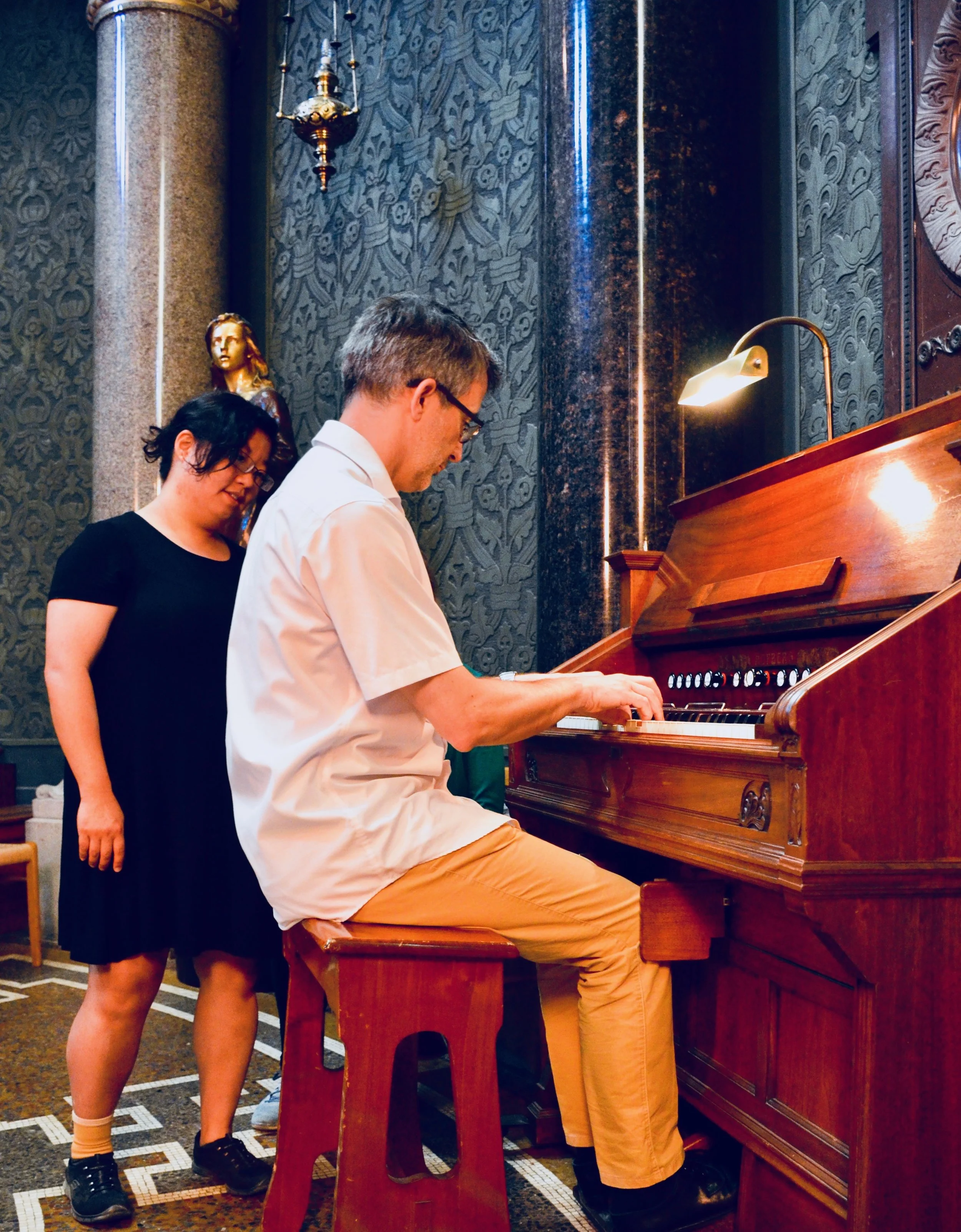 Sven Verner Olsen demonstrates one of Jesuskirke's 46 harmoniums. 