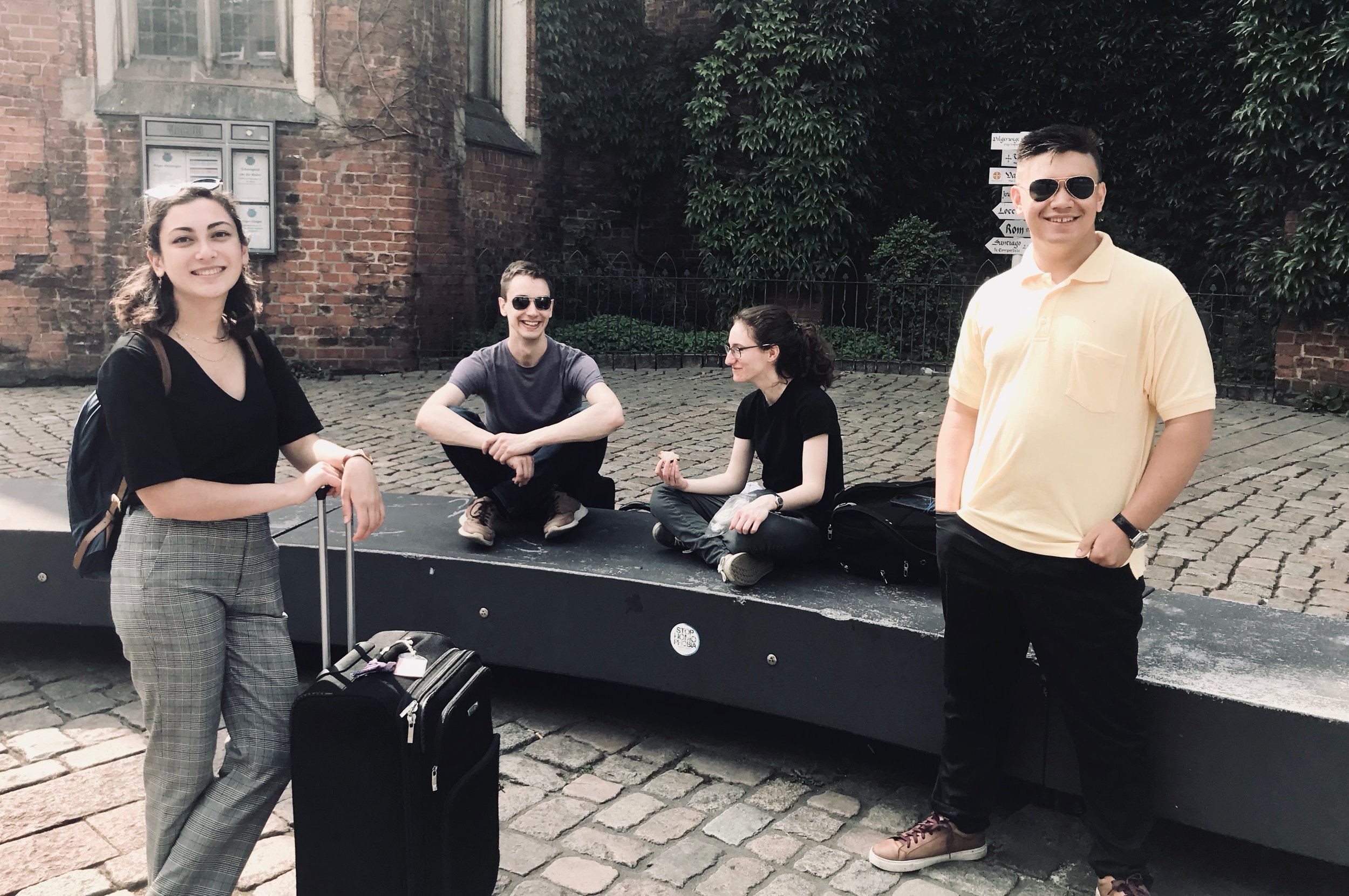 Meg Cutting, Alex Ross, Rosemarie Tougas, and Alexander Straus-Fausto upon arrival in Hamburg, Germany.
