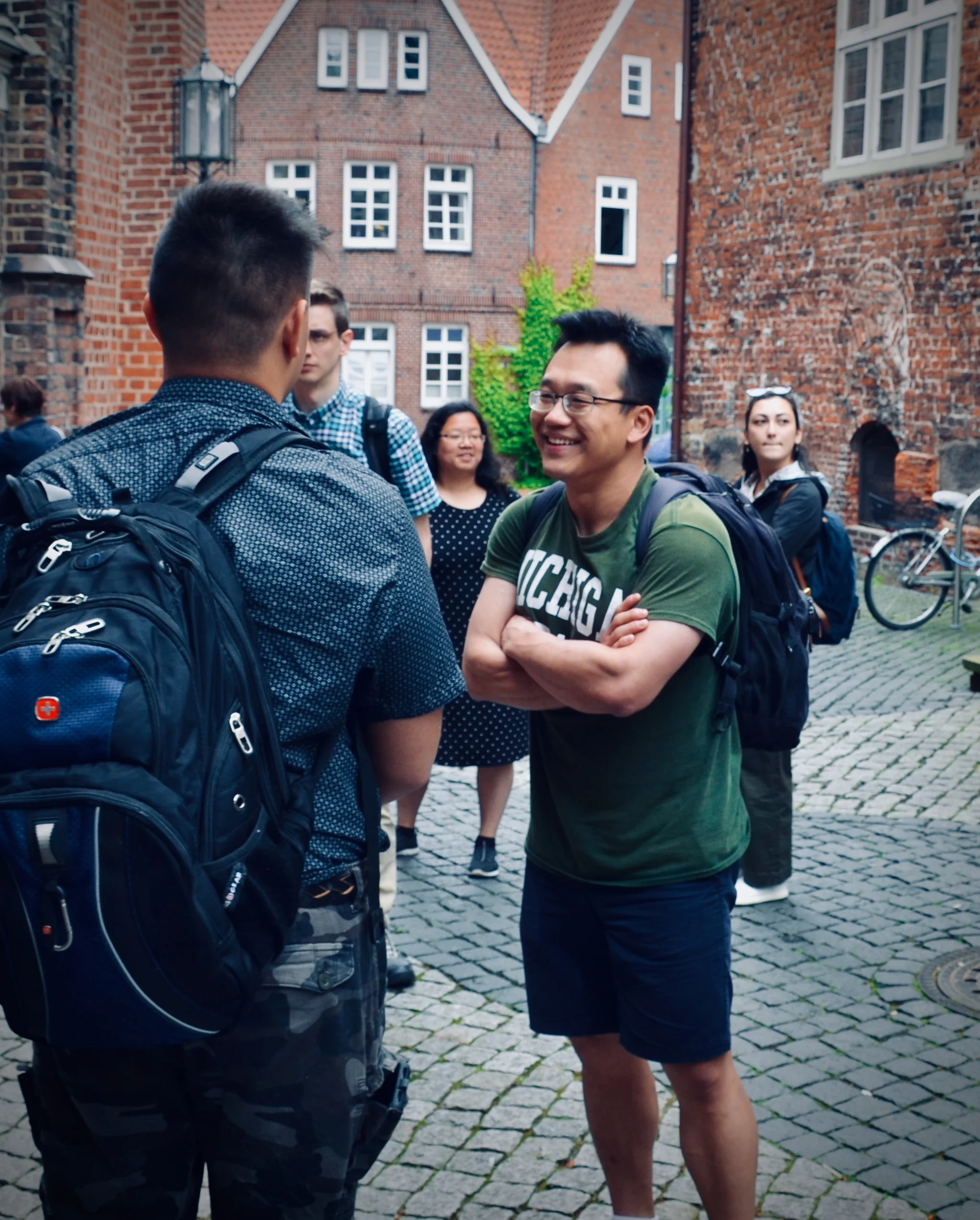 Adrian Cho greets the group in Stade.