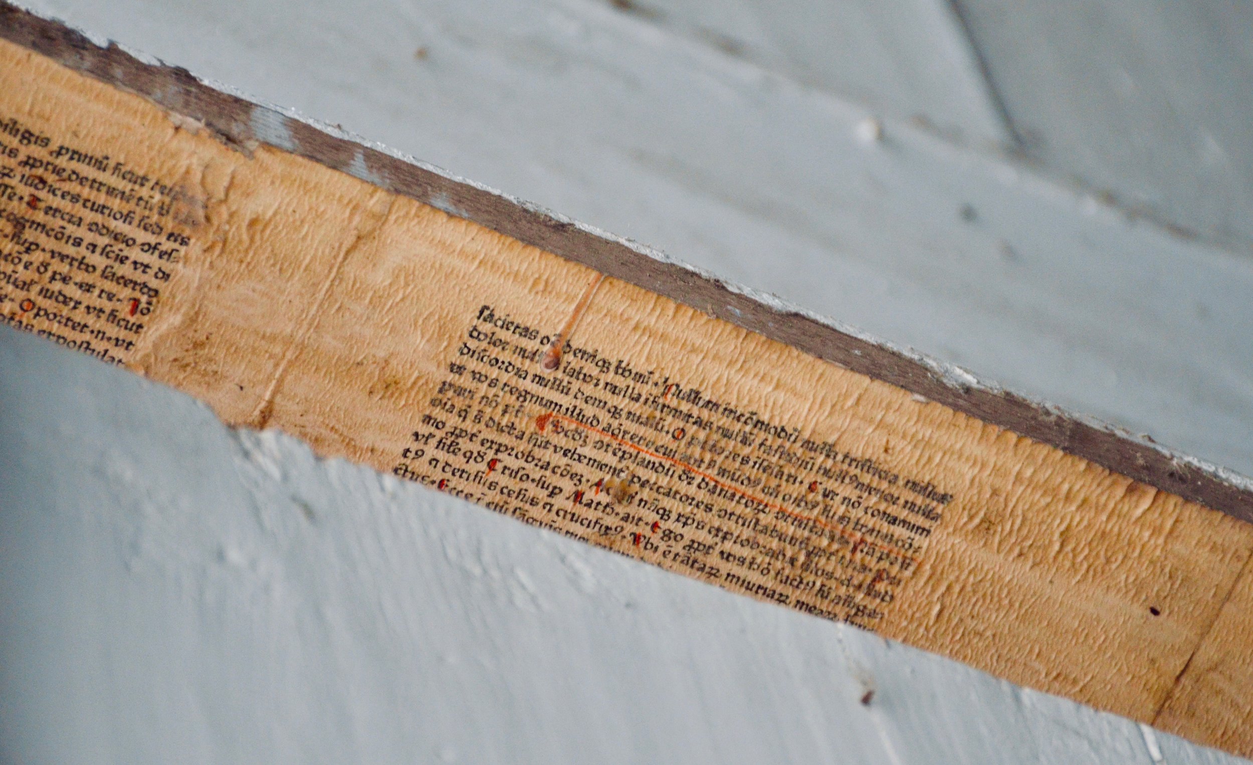 Latin manuscripts line the bellows room of the 1624 Scherer Organ, St. Stephanskirche, Tangermünde.