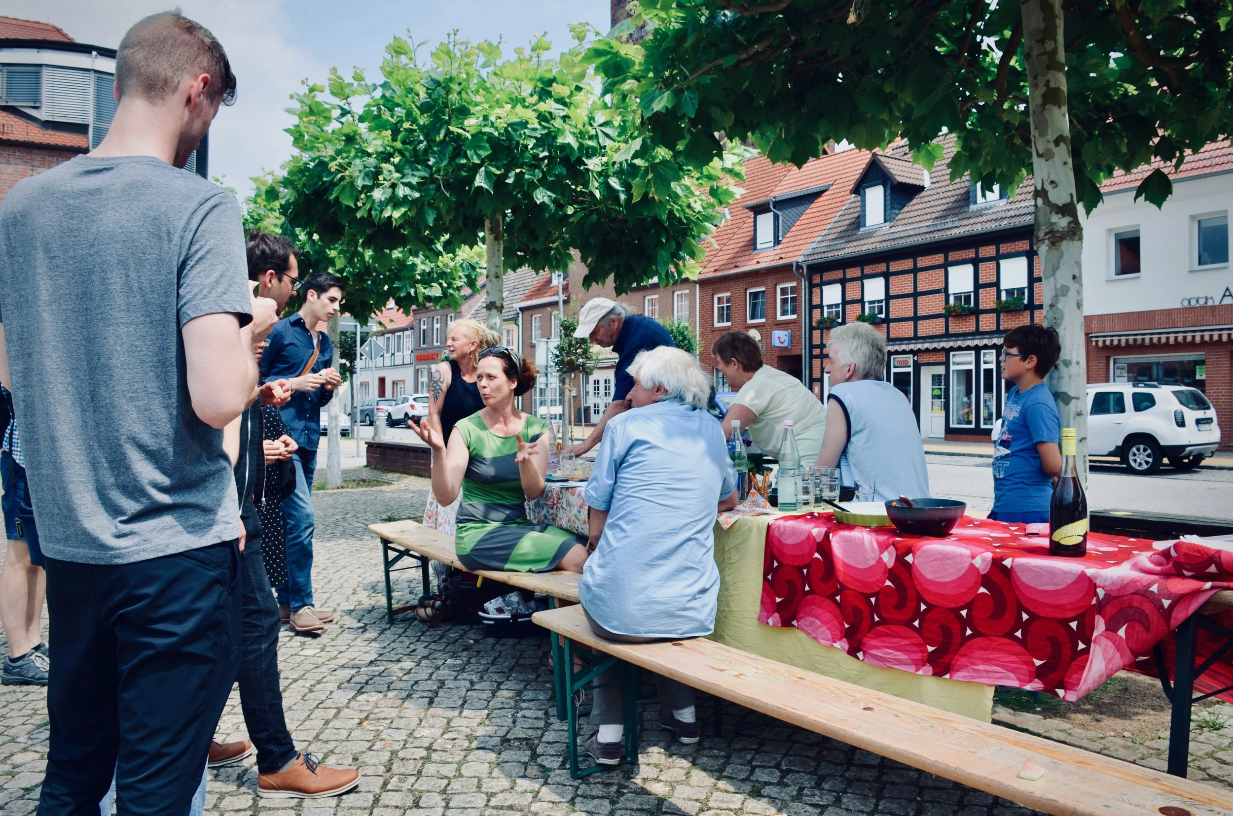 Chatting with locals in the central square of Seehausen, Germany, during “open civilization day.”
