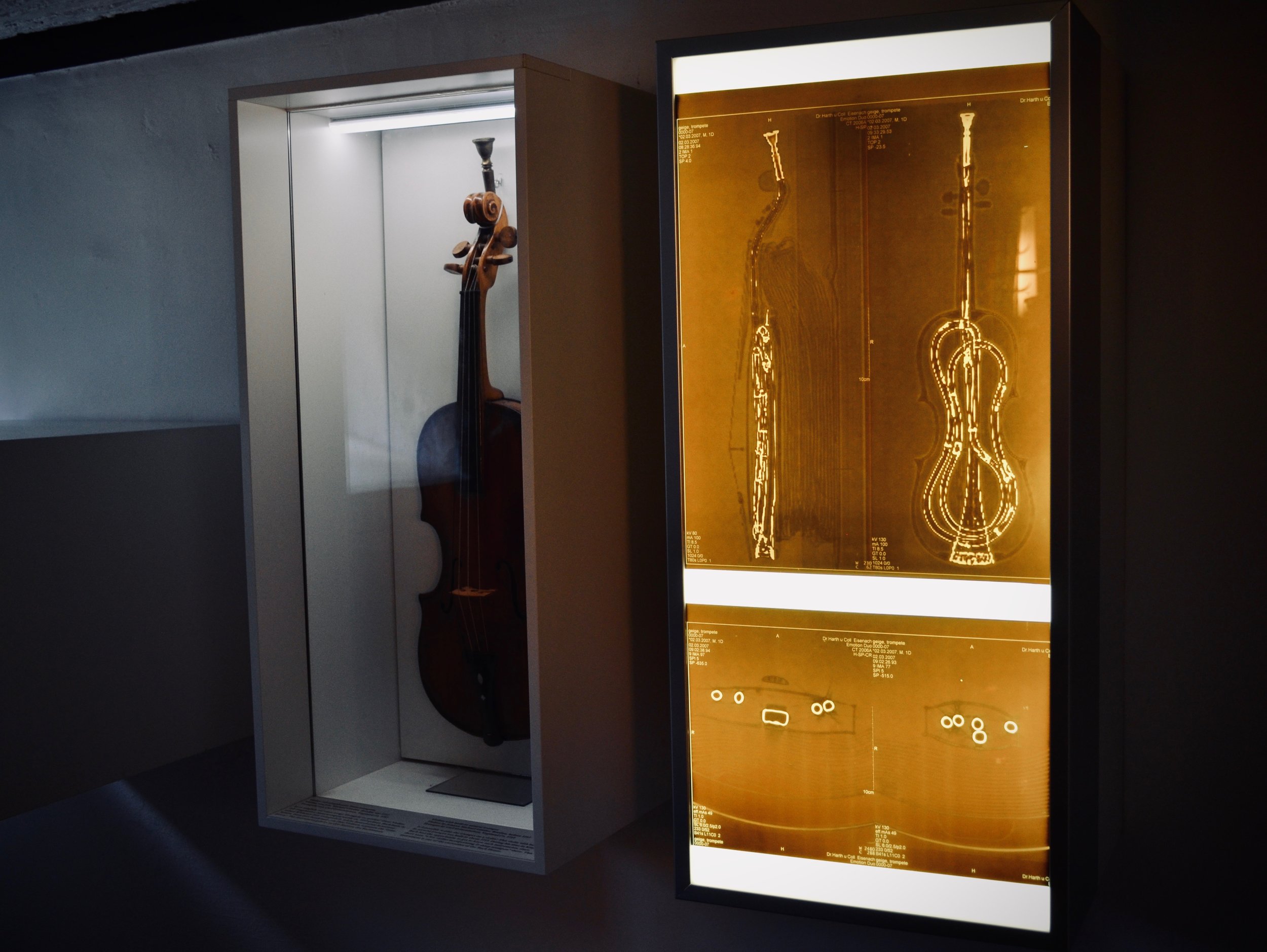 The x-ray shows how the trumpet is placed inside of the violin.