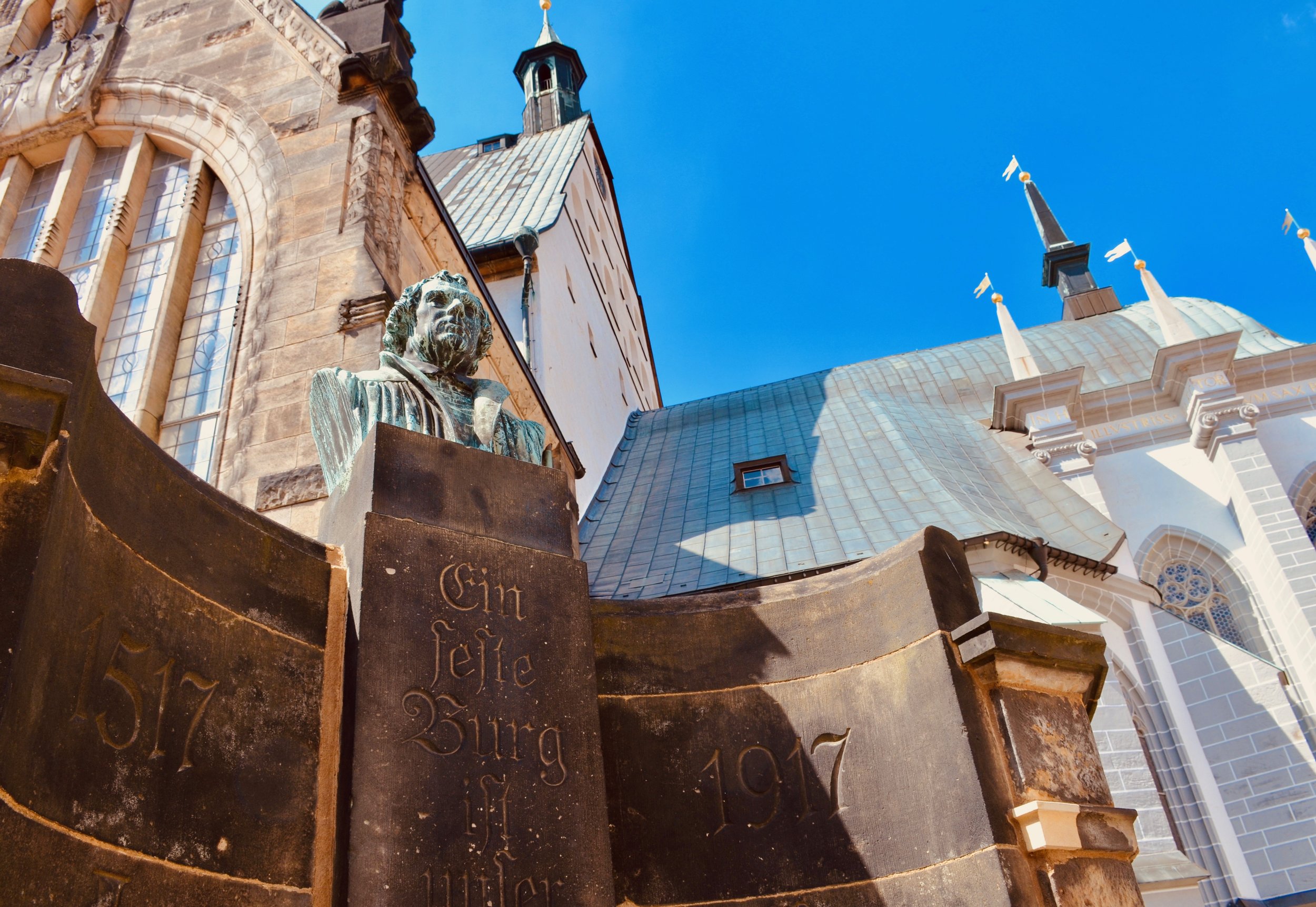 The Freiberg Dom, with a statue commemorating Martin Luther.