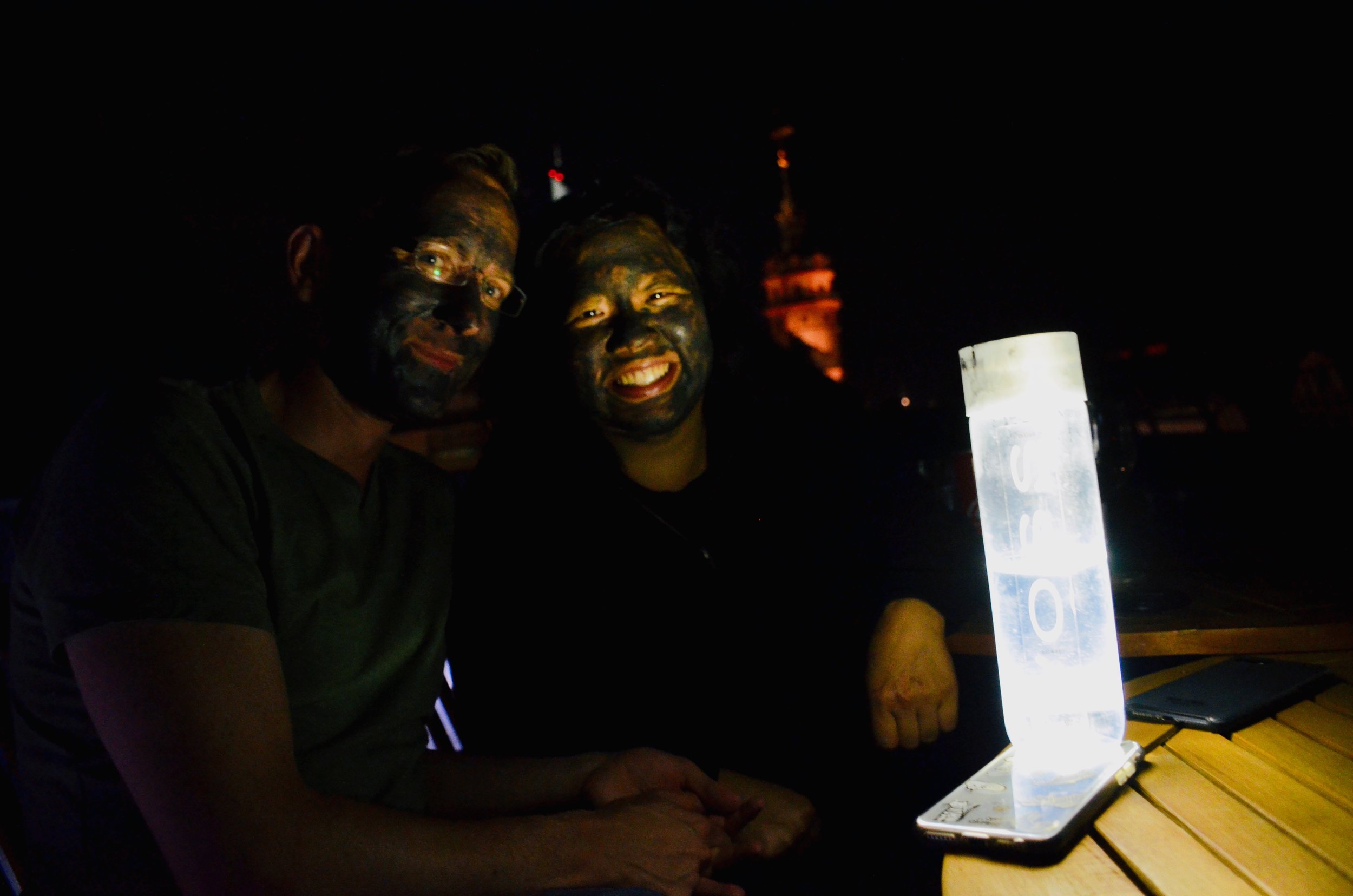 Chris and Jennifer, with face masks applied (and Nikolai in the background).