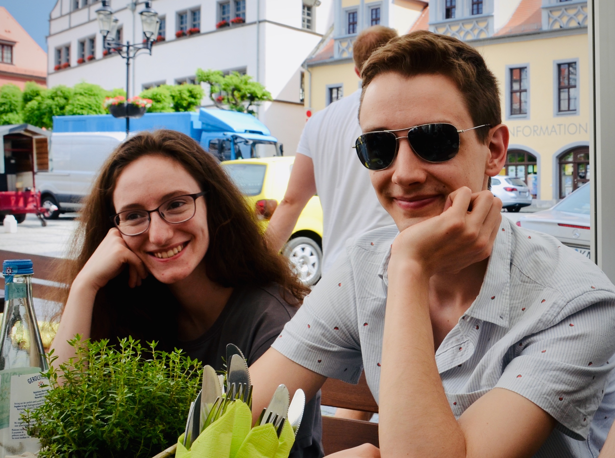 Rosemarie and Alex enjoy lunch in the market square, Naumburg, Germany.