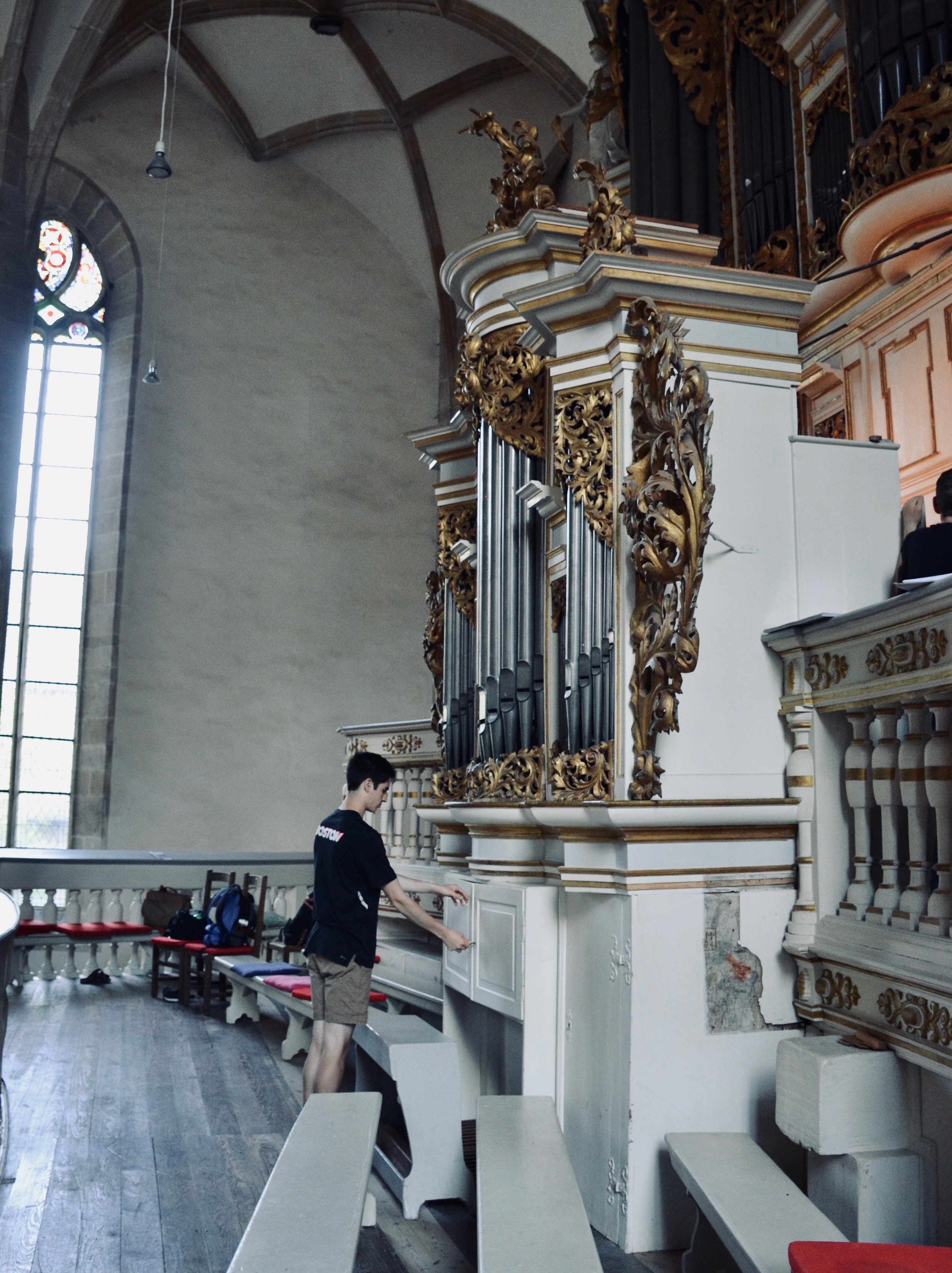 Alex Marin opens the cabinet to the Postiv organ console, 1855 Ladegast Organ, Merseburg Dom.