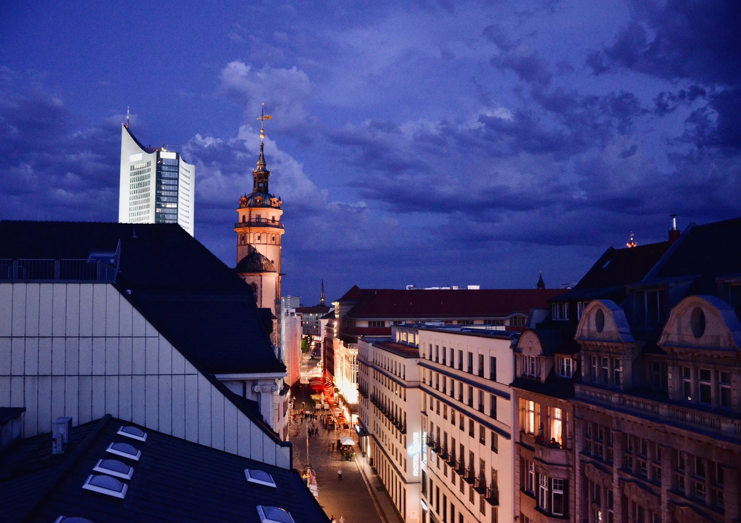 A stunning evening on the roof top, with the spire of Nikolaikirche, Leipzig.