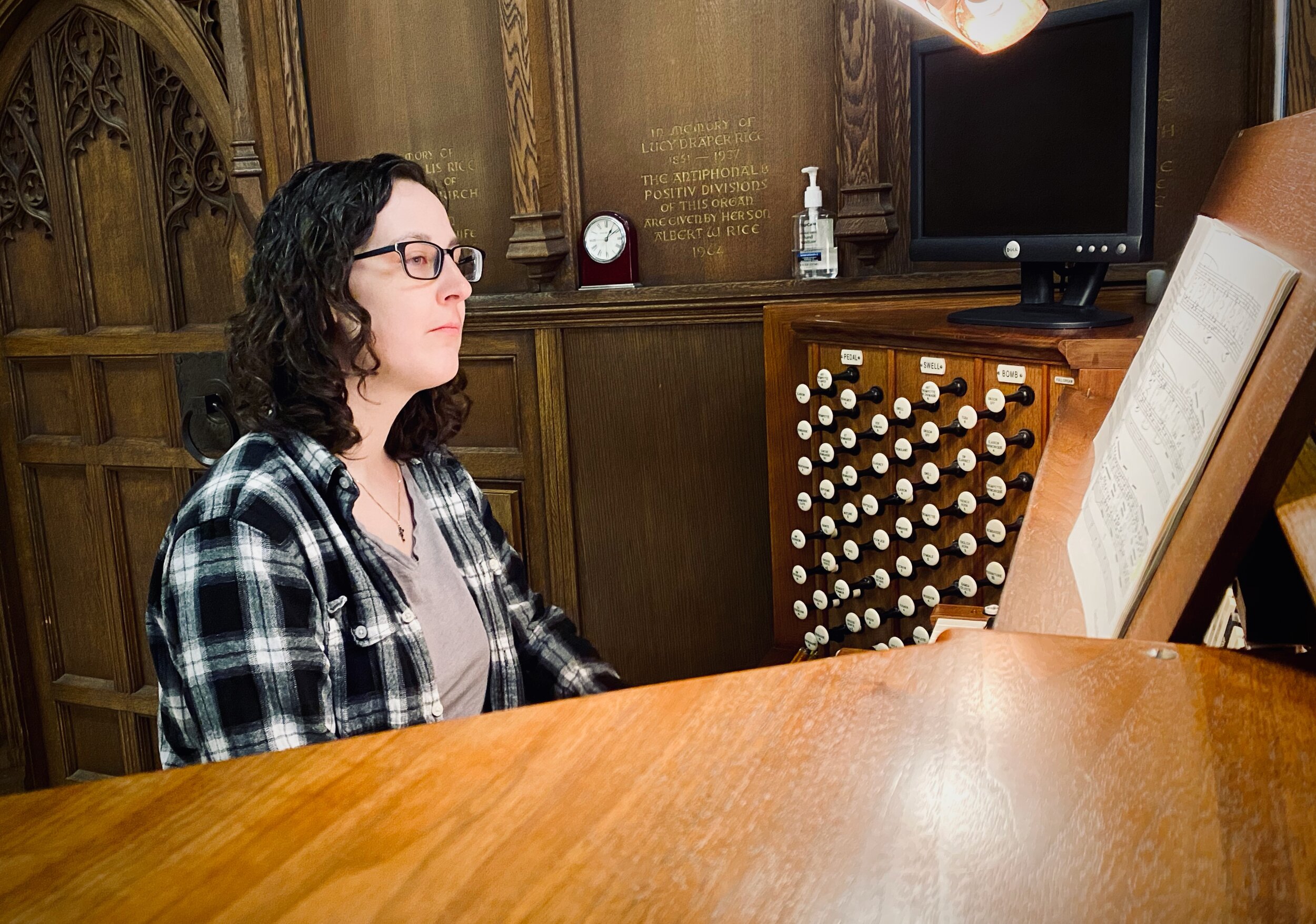 Katie Yosua at the console of the Aeolian-Skinner organ, All Saints Church, Worcester, Mass. 