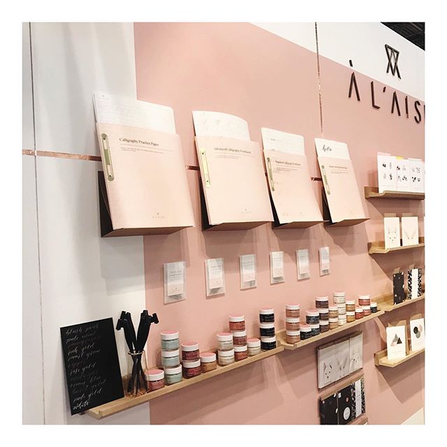 Day 2 @ny_now and a closer look at calligraphy corner and our updated calligraphy workbooks. Translucent pink covers and brass binding. We&rsquo;re in the handmade section, stand 1240b. We&rsquo;d love to say hi if you&rsquo;re visiting! #nynow #nati