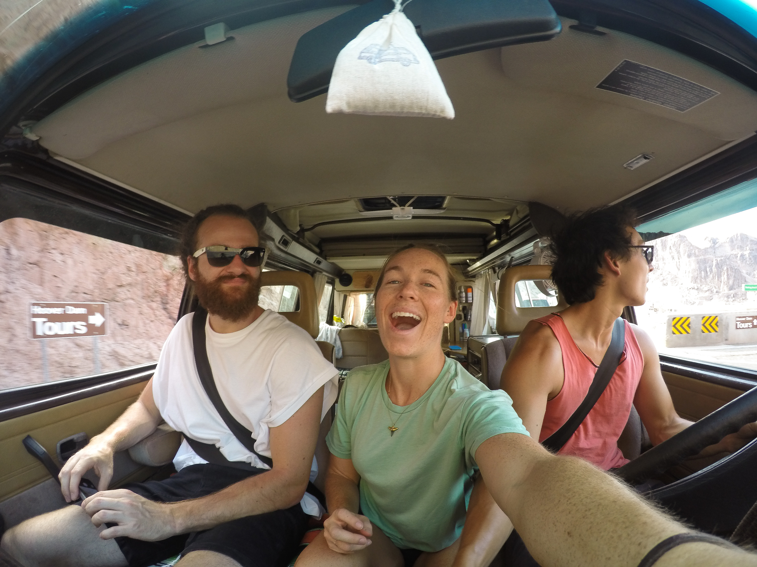 Bartos, MAK, & Owen driving into the Hoover Dam after our longest and hottest break down. Only 118 degrees.