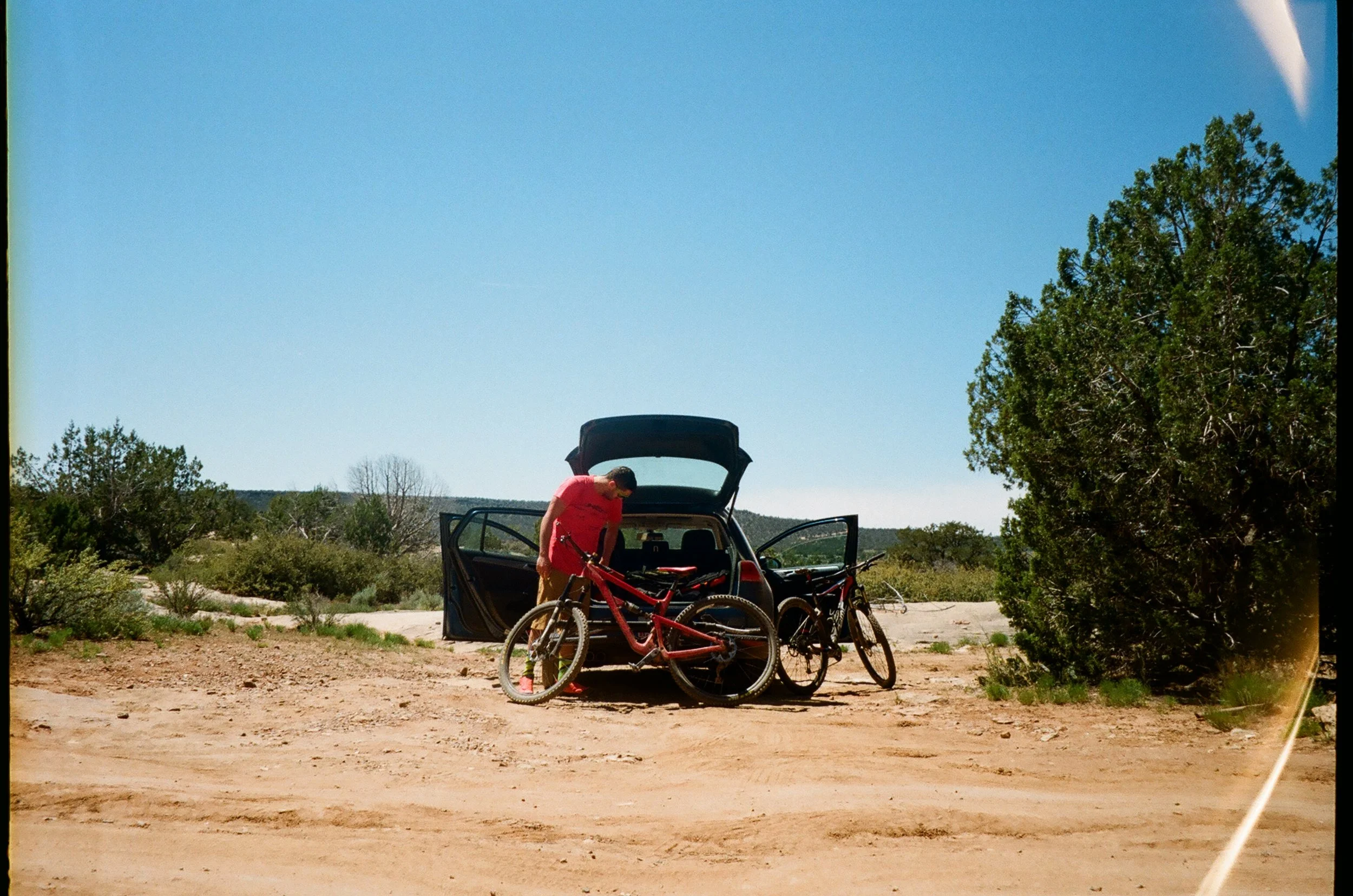 Danny prepping the bikes in St. George, UT - 35mm 