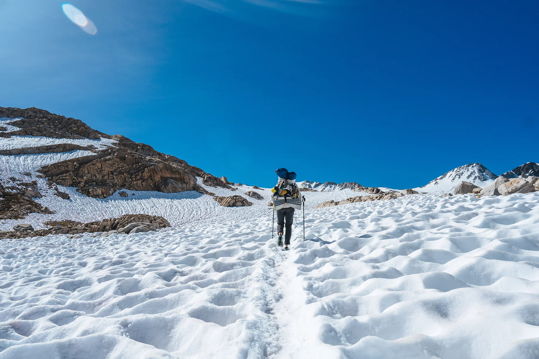 MAK heading up a pass with the help of her trekking poles