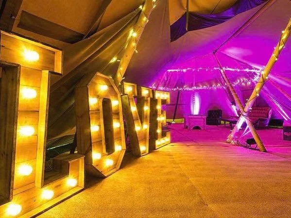 rustic-love-with-uplighters-.jpg