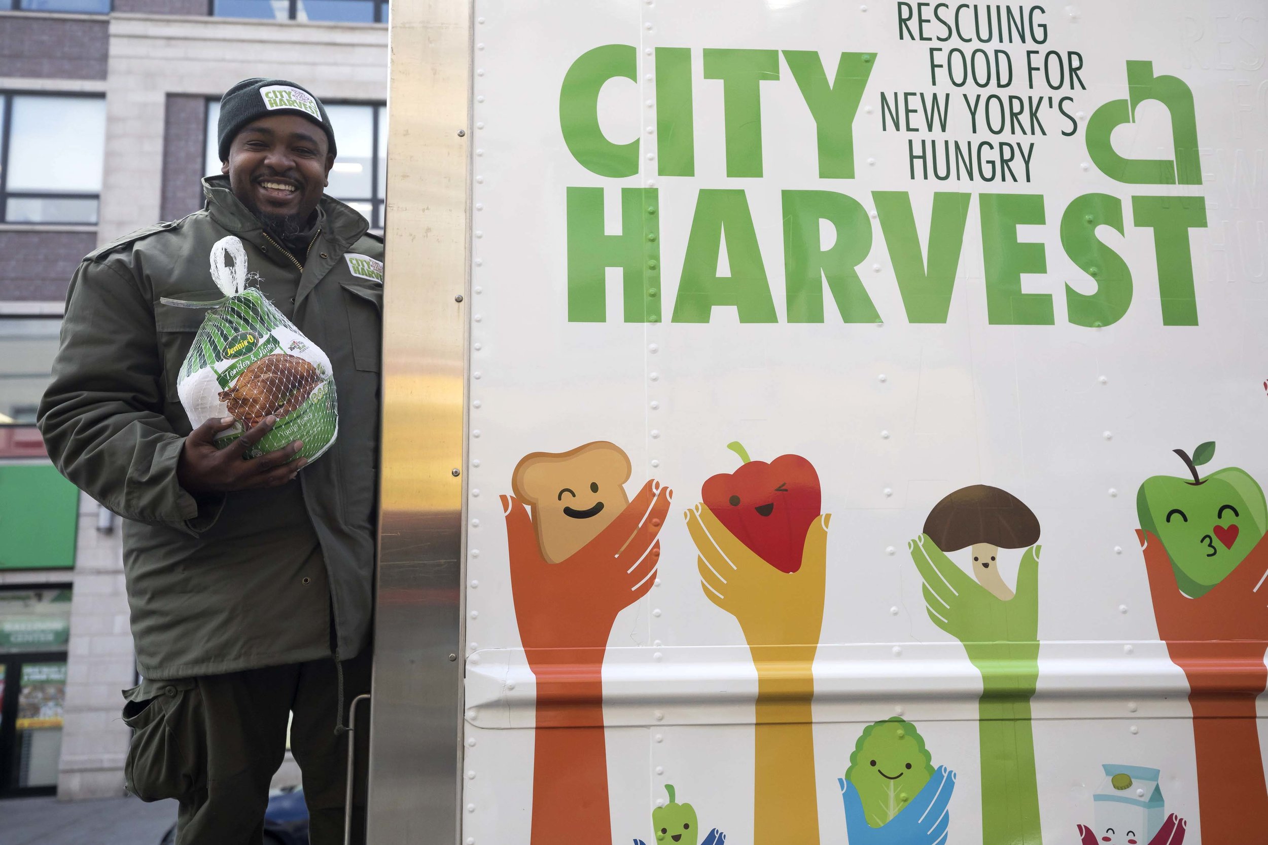 City Harvest Truck Drive Mike Smith with Thanksgiving Turkey