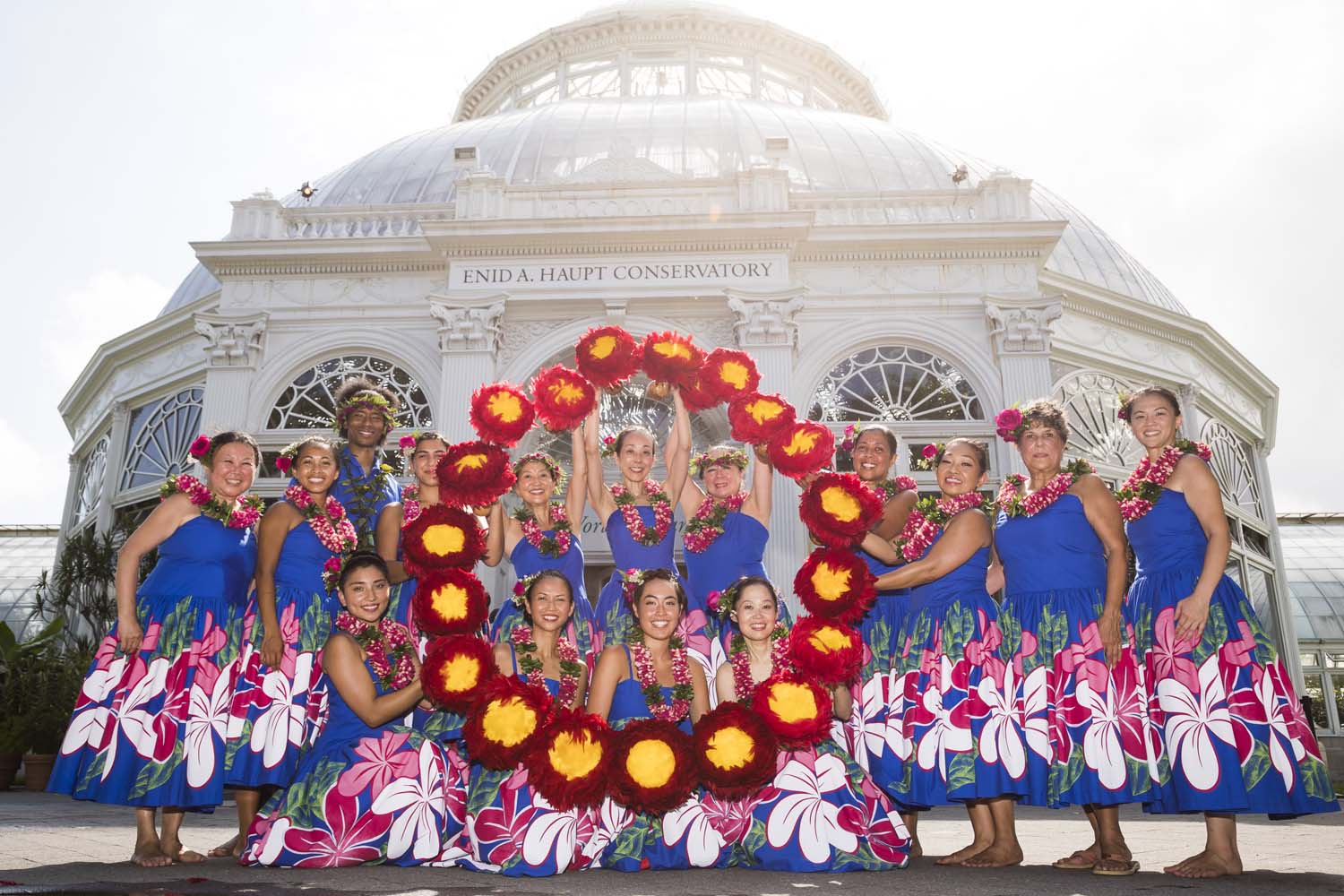 Group Photo of Hula Dancers with Flowers
