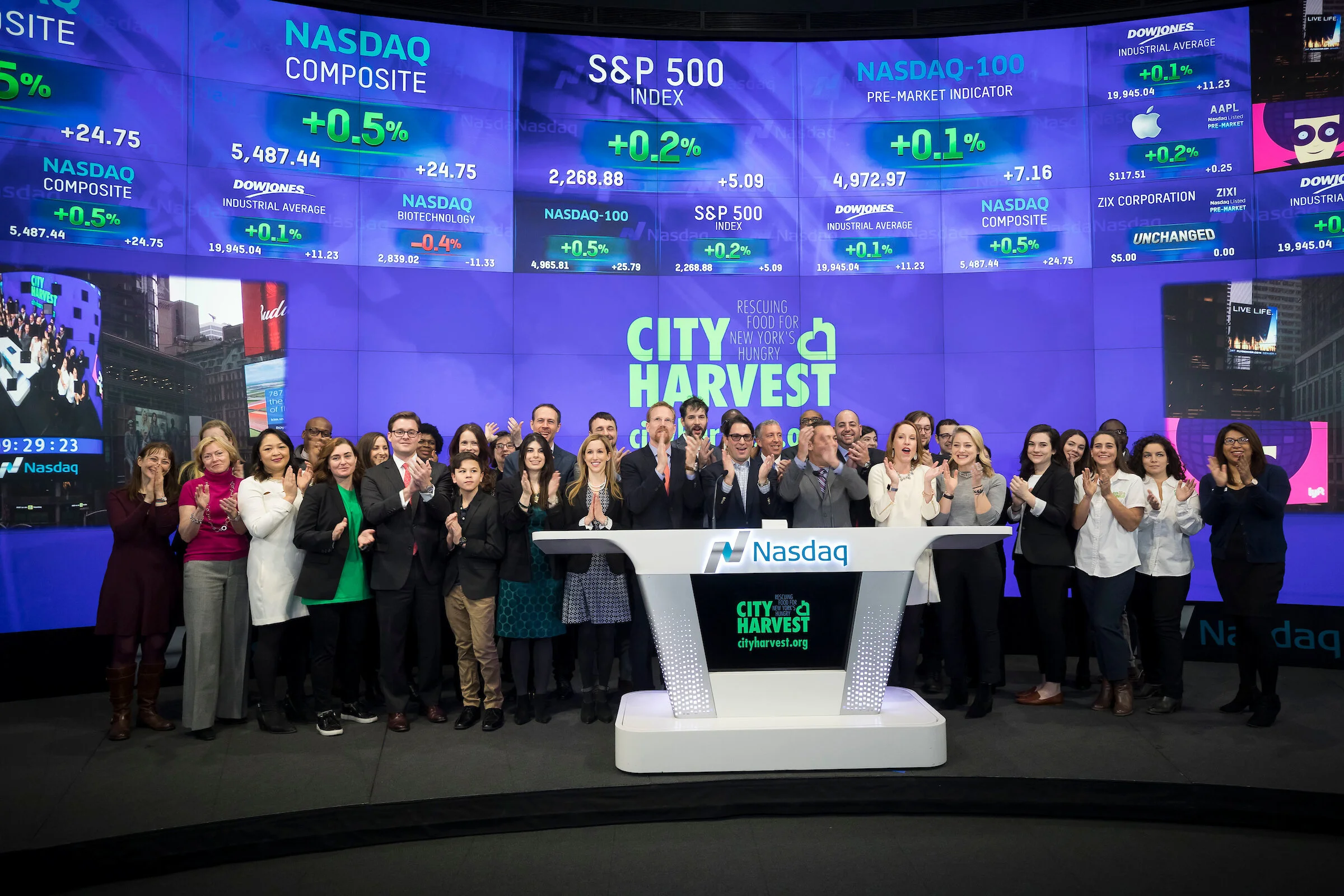  City Harvest non profit photography ringing the Nasdaq closing bell in Times Square but photographer Ben Hider 