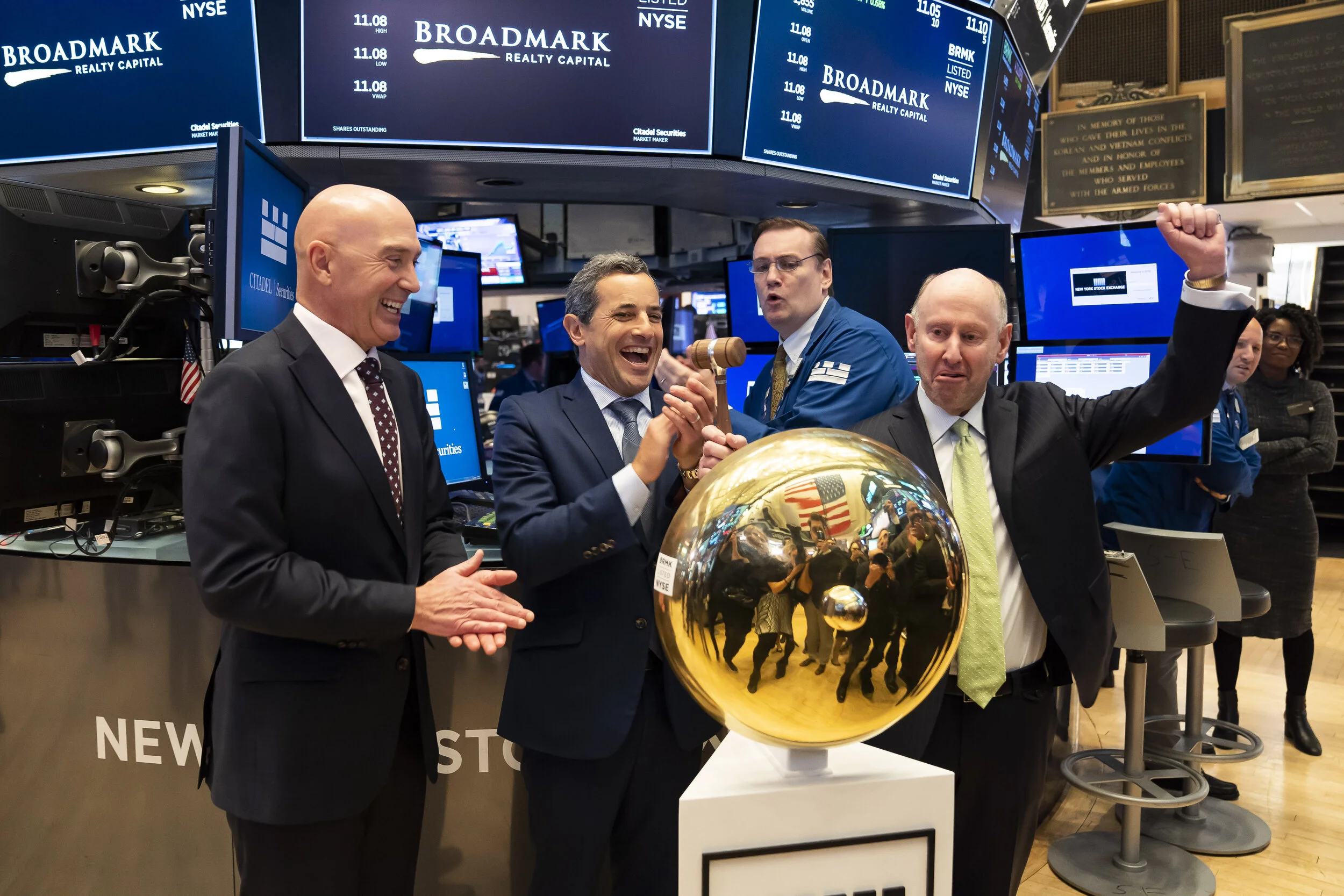  NYSE bell ringing photographer by Ben Hider on Wall Street. 