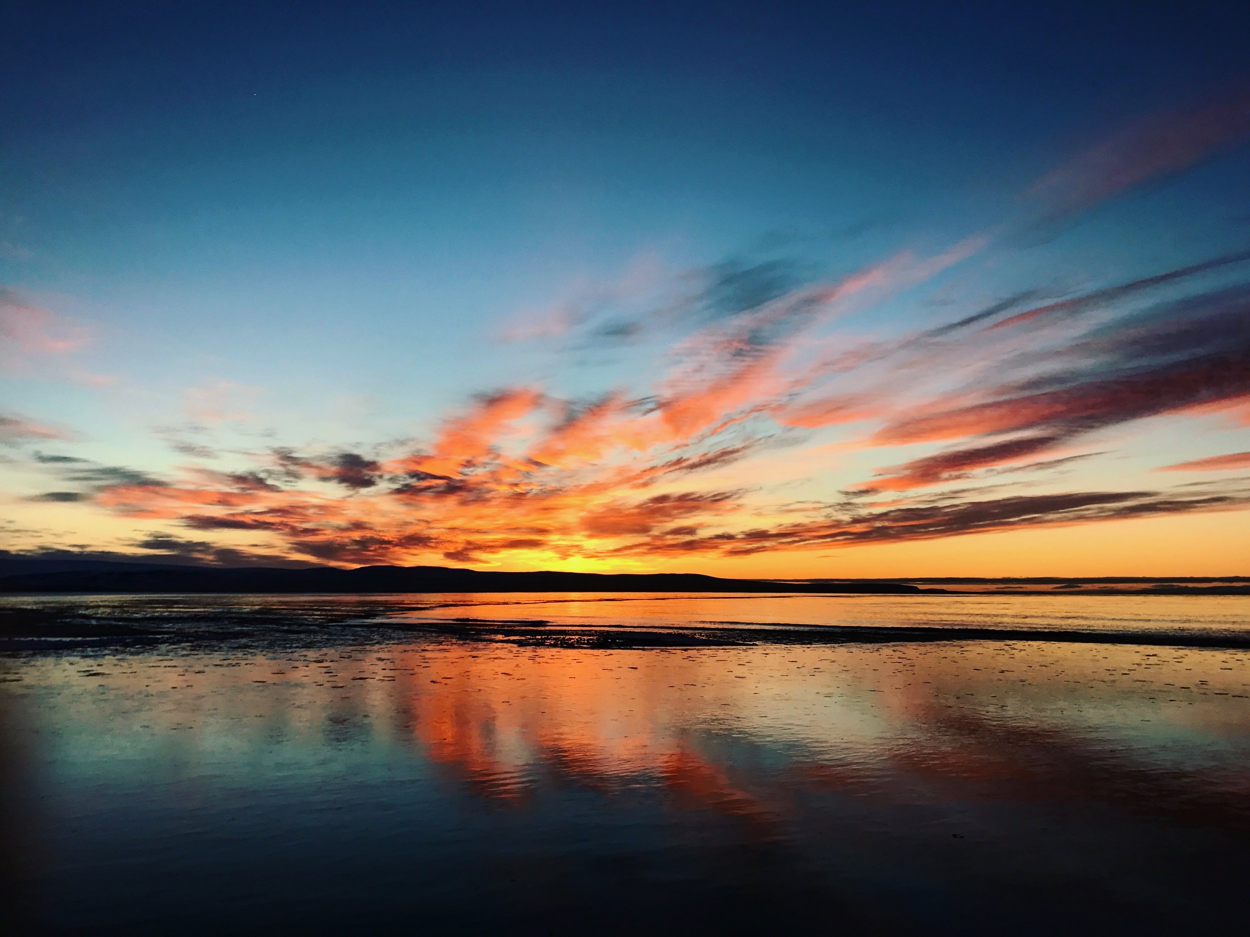 Sunset from my daily perch, where the Blanda River meets the ocean - Blönduós, Iceland.