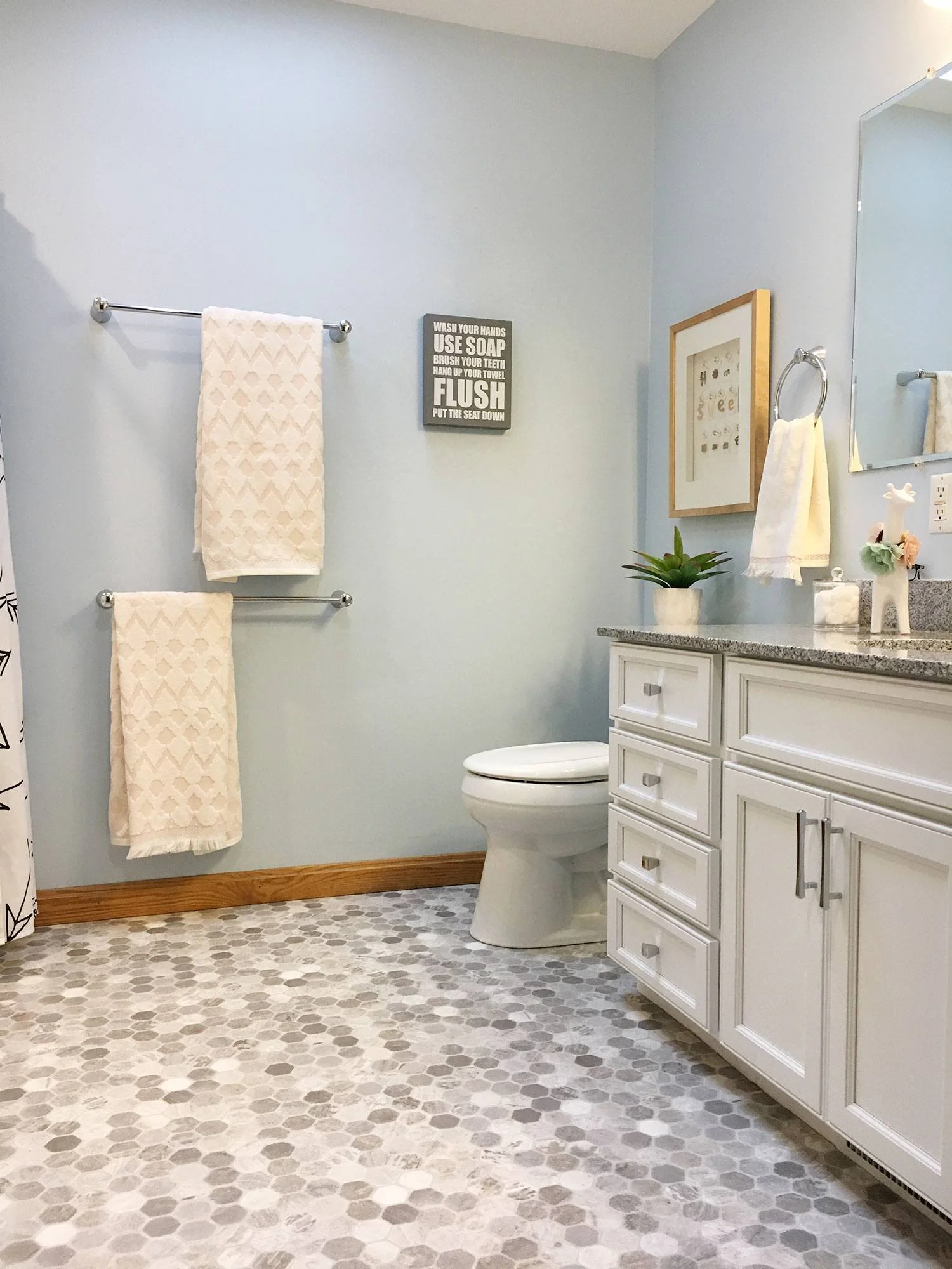 bathroom-with-laundry-gray-flooring.jpg
