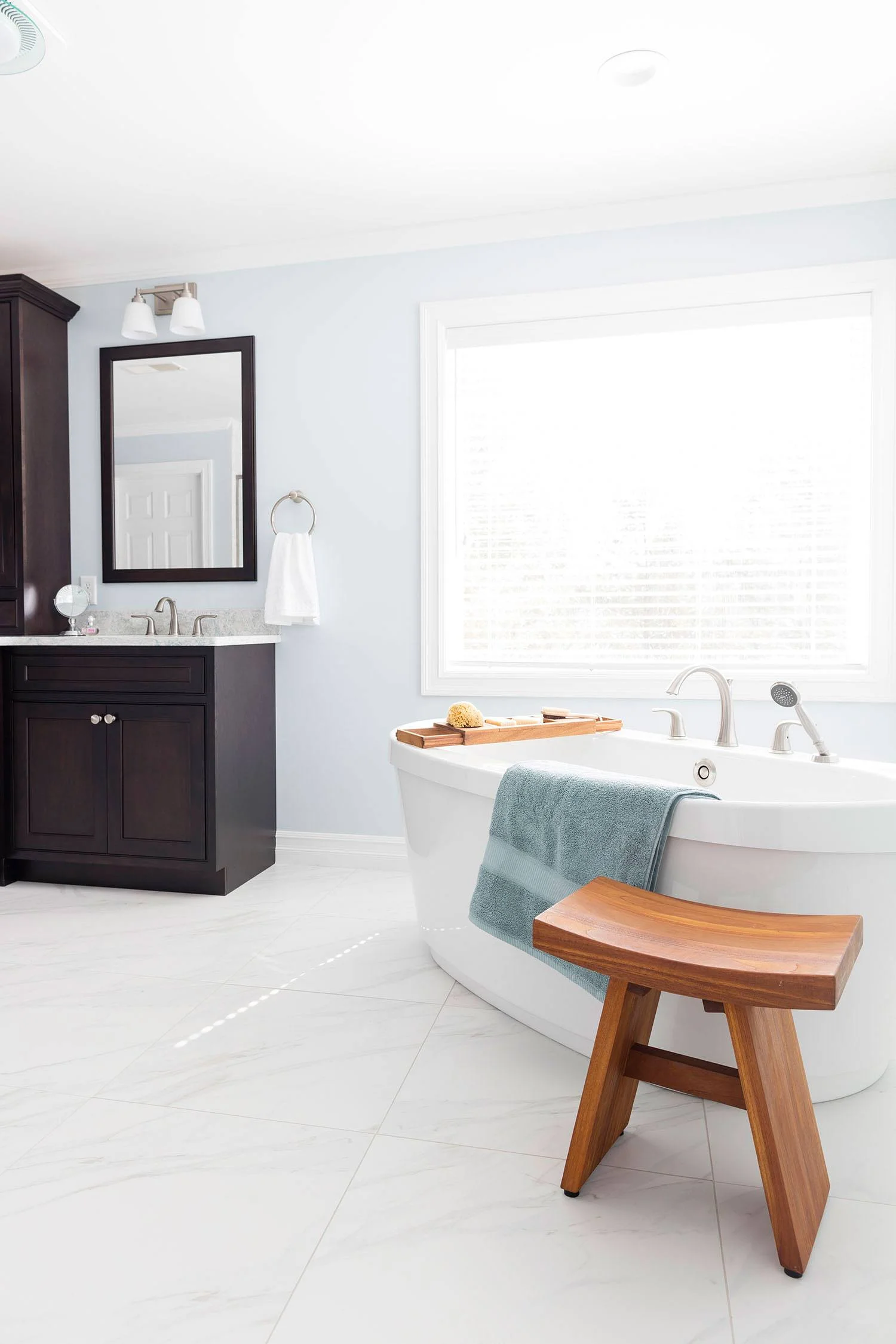 bath-retreat-master-freestanding-tub-white-tile-floor.jpg