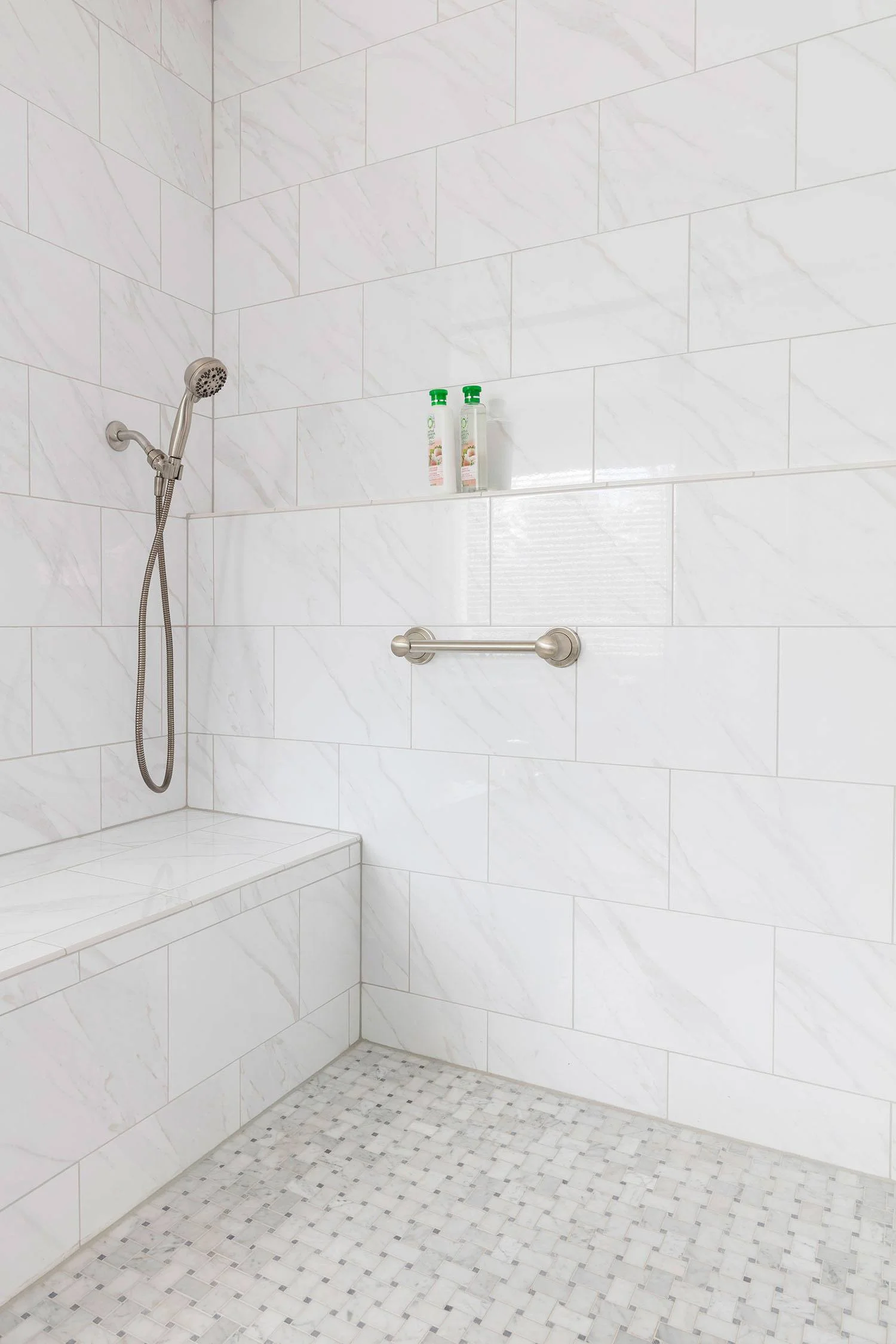 bath-retreat-master-white-tile-shower-bench.jpg