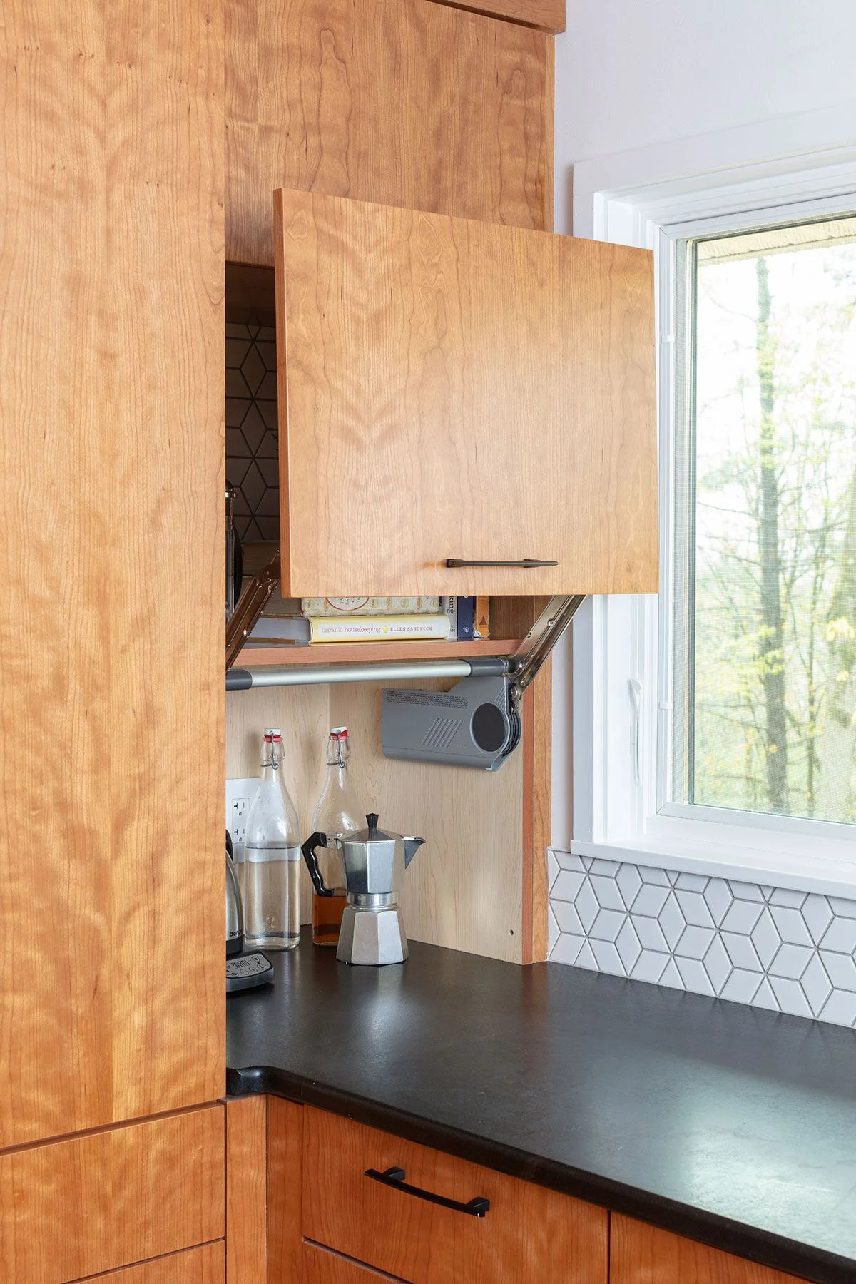 sleek-modern-kitchen-cabinet-open-upward-hide-coffee.jpg