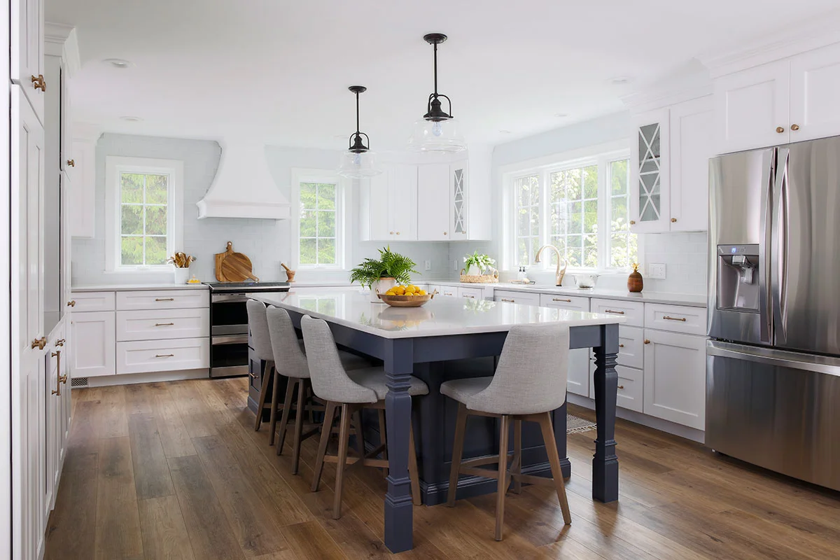 White Kitchen with Navy Blue Island Wins Design Award