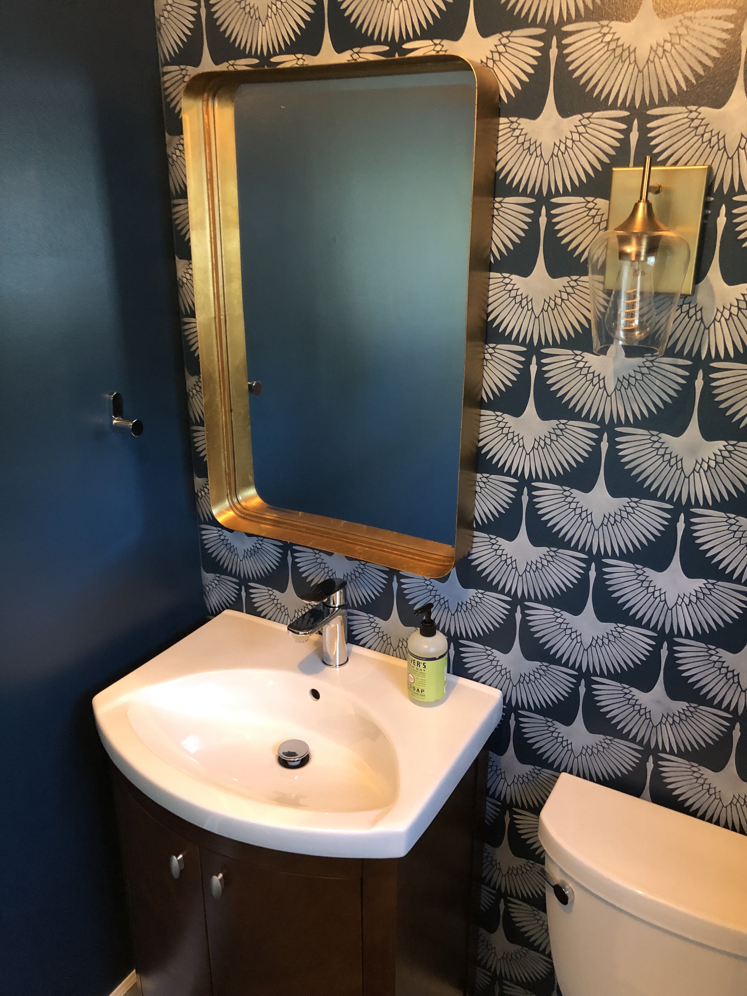 Midcentury Cranes On Powder room Accent Wall