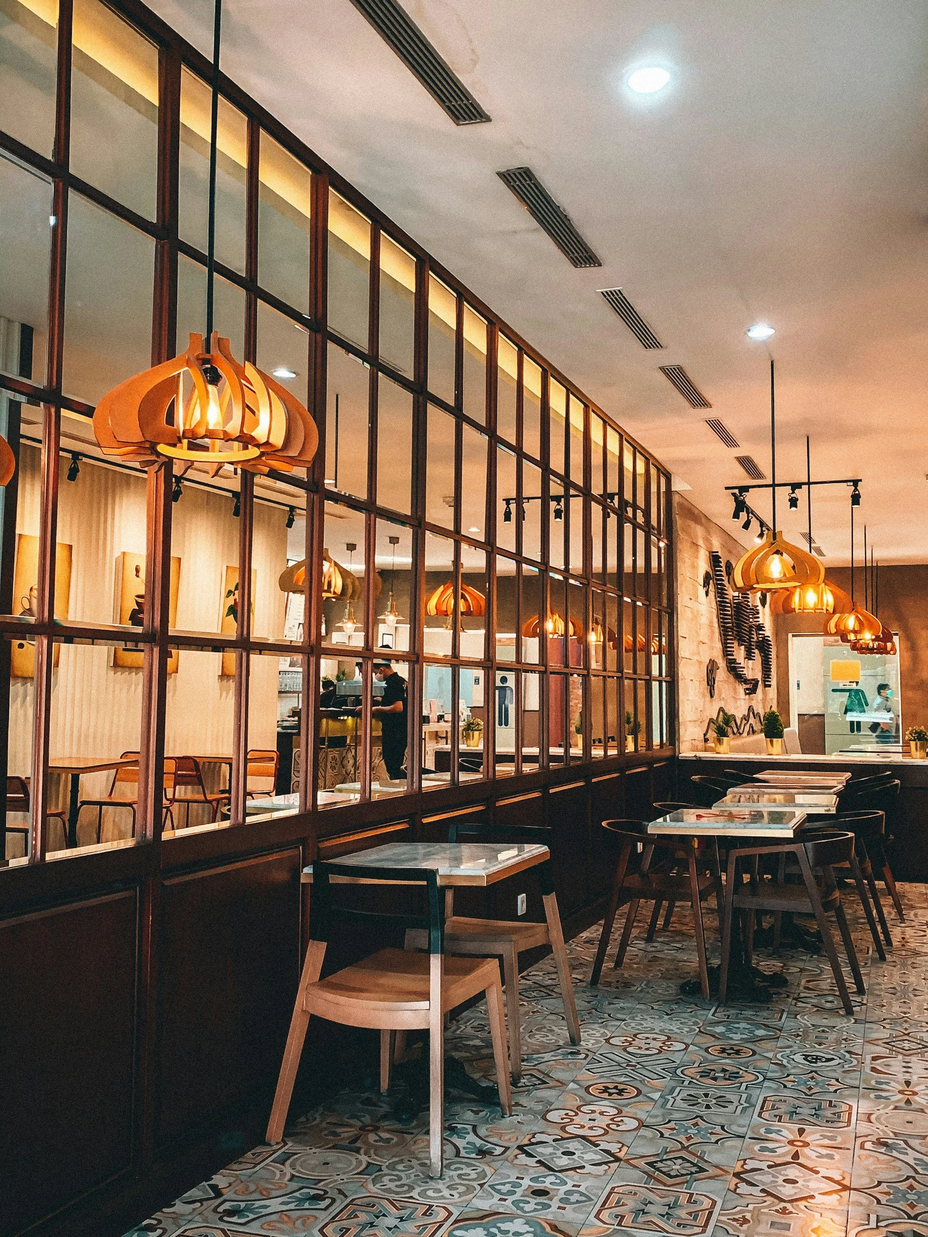 Hospitality fit-out with patterned commercial floor tiles