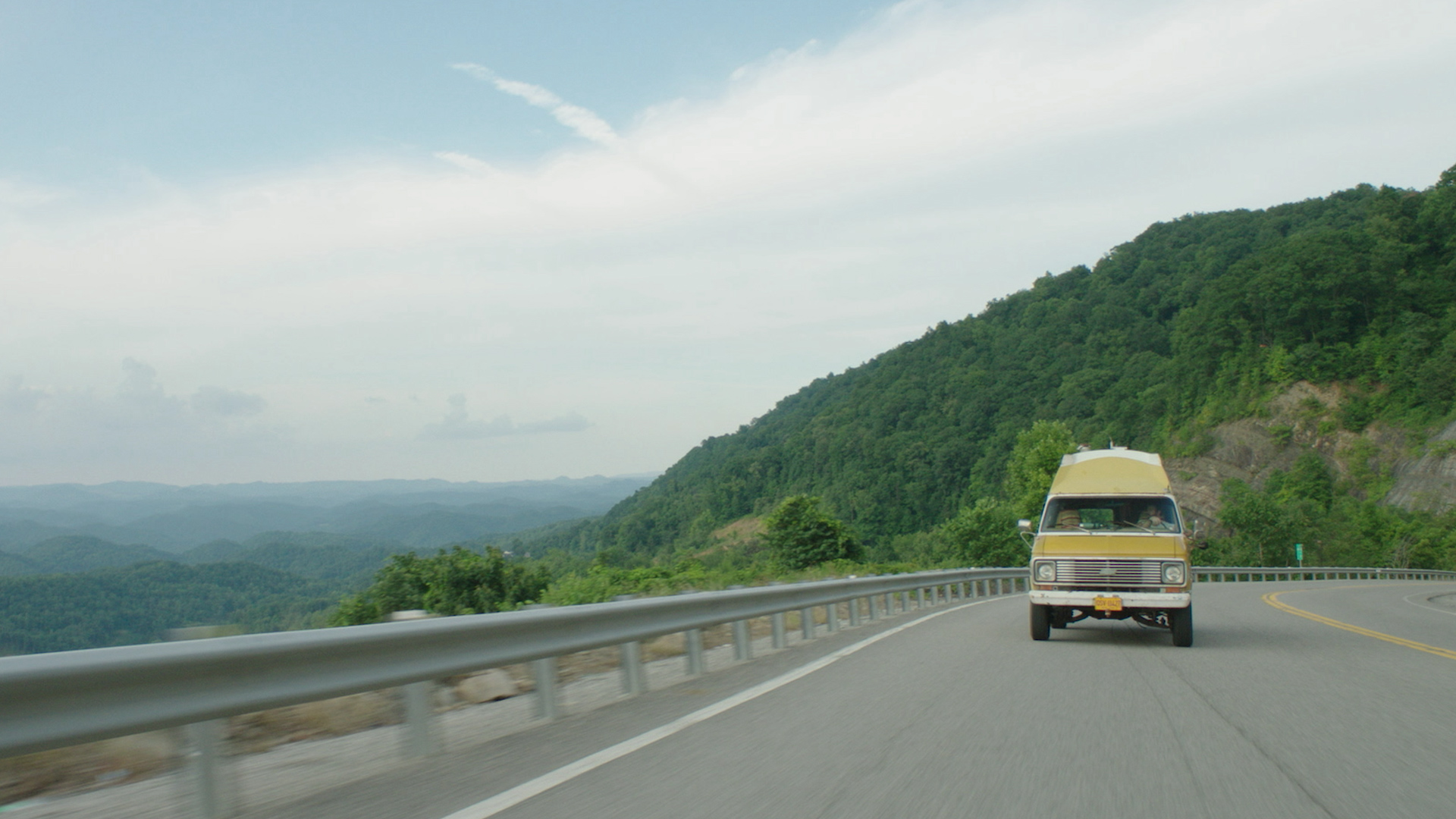 Van driving through mountains_1920x1080_ProRes422HQ_2398_MOS.00_00_02_13.Still001.jpg
