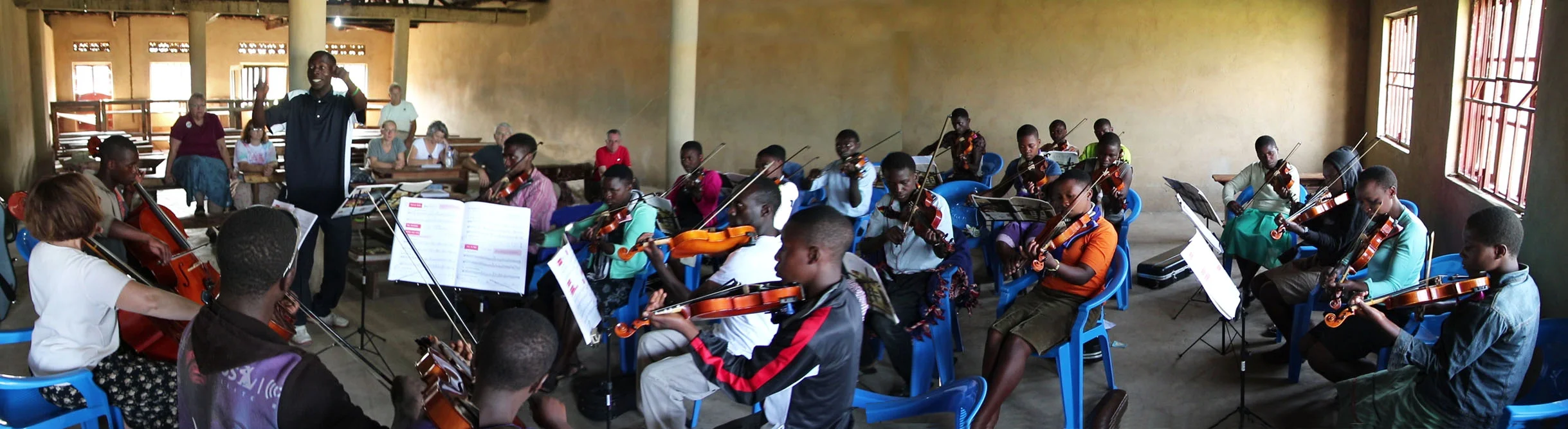 Howard leading the orchestra concert