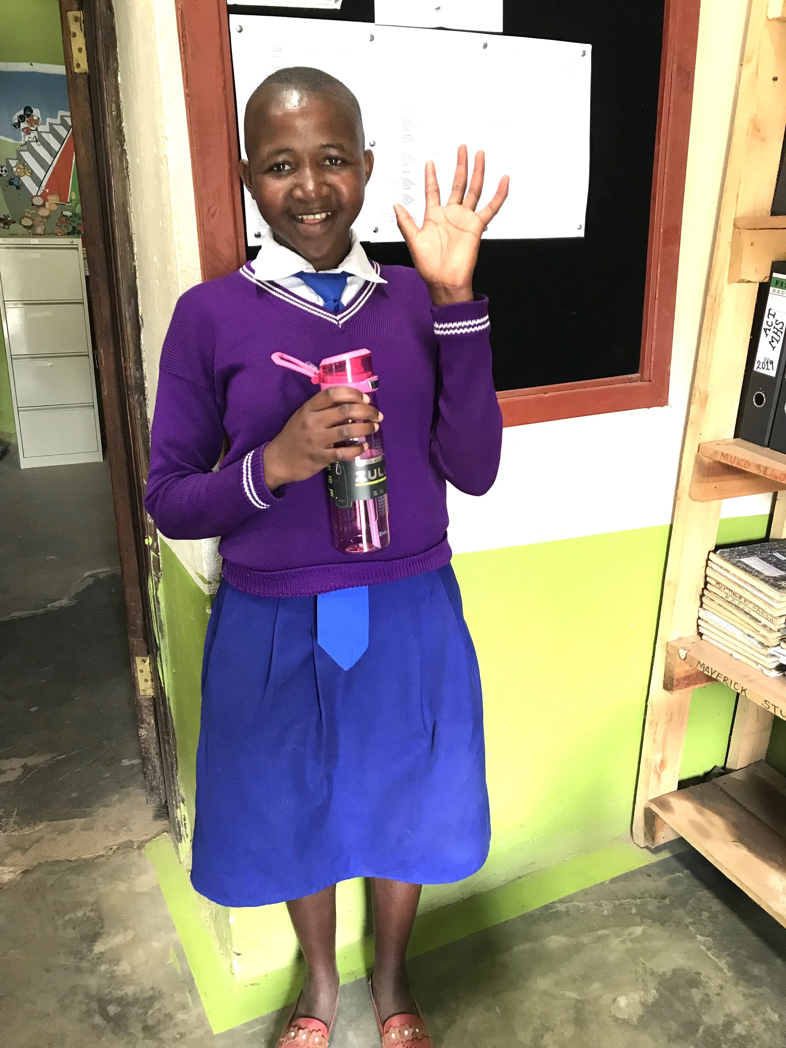 Precious prepares for classes at Muko High School.