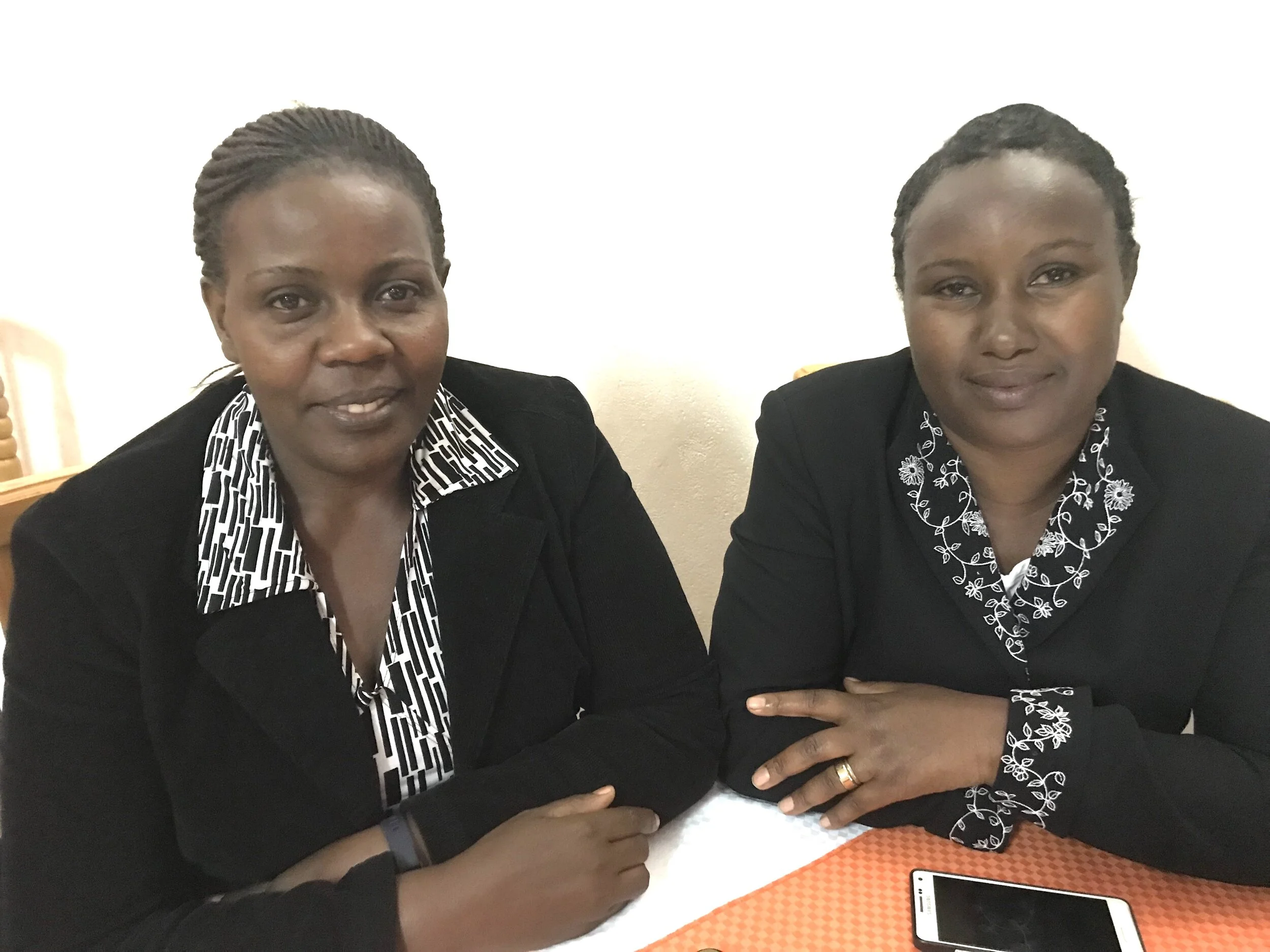 2 Beautiful Professional Ugandan Women: Lydia Komugisha and Generous Turinawe. Lydia is a Hospital Administrator and the past Chair of the ACT Uganda board. Of course, Generous is our highly competent Director of ACT!