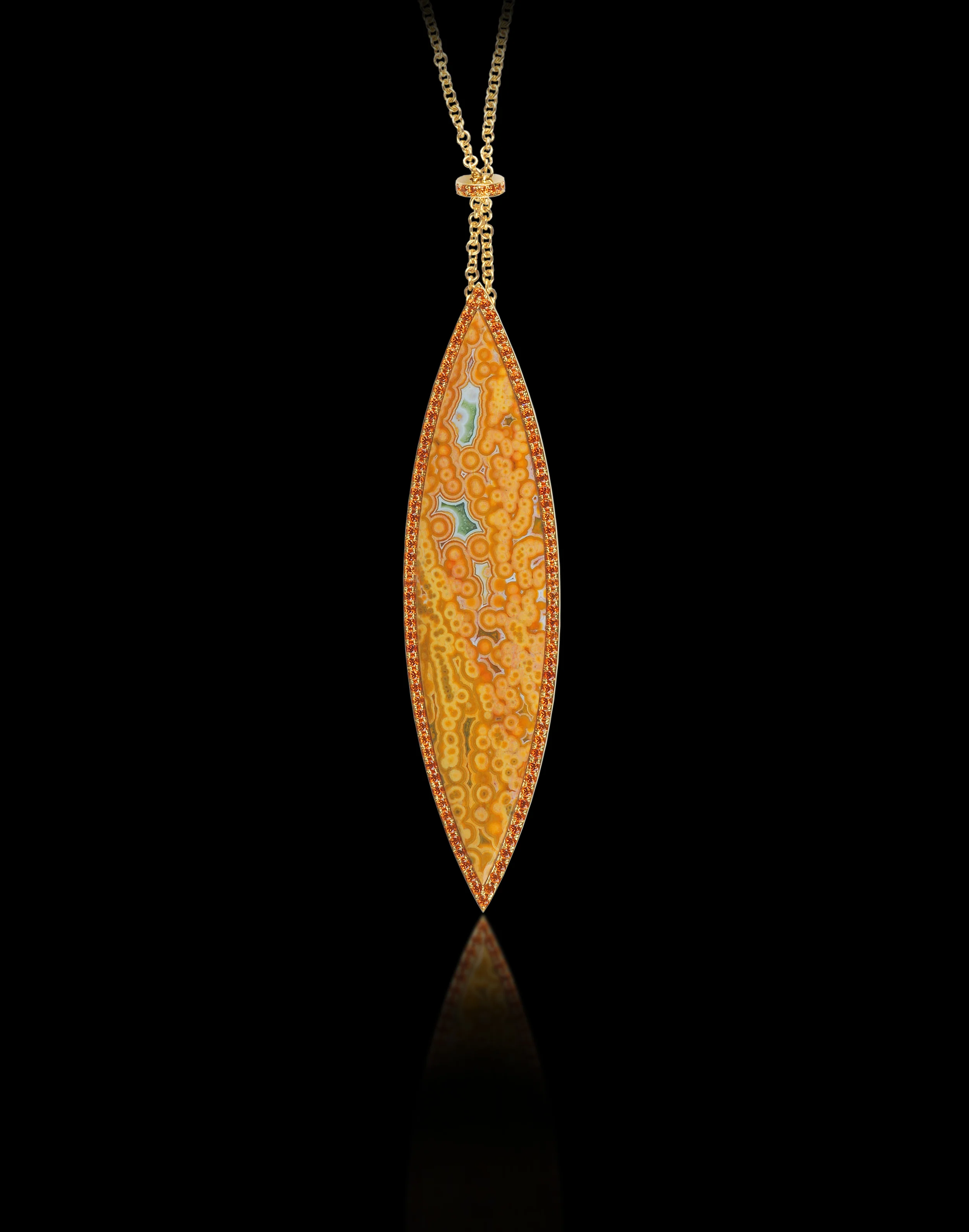 Pendulum Elegance resides naturally in all of nature’s wonders. Brooch and Pendant in 18 karat Yellow Gold, and Spessartite Garnets $4,000