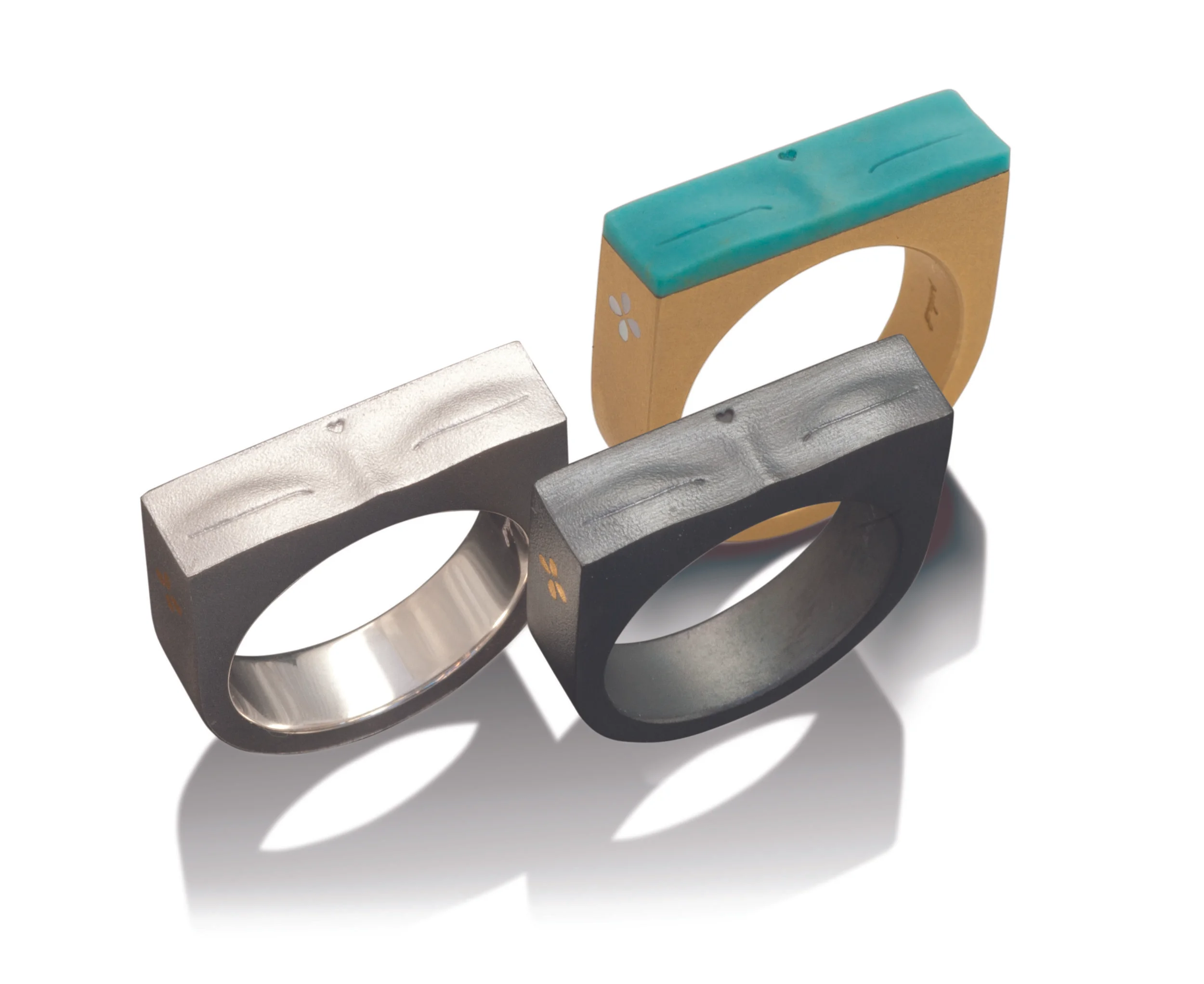wedding rings with a buddha personality in 18k yellow gold with or with out turquoise and in silver natural or blackened 
