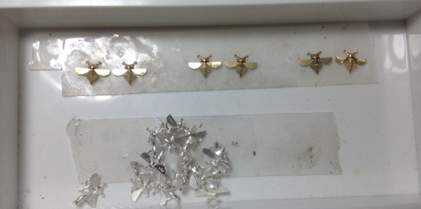 18k yellow and silver Bees lining up for grooming into flashy little earrings&nbsp;