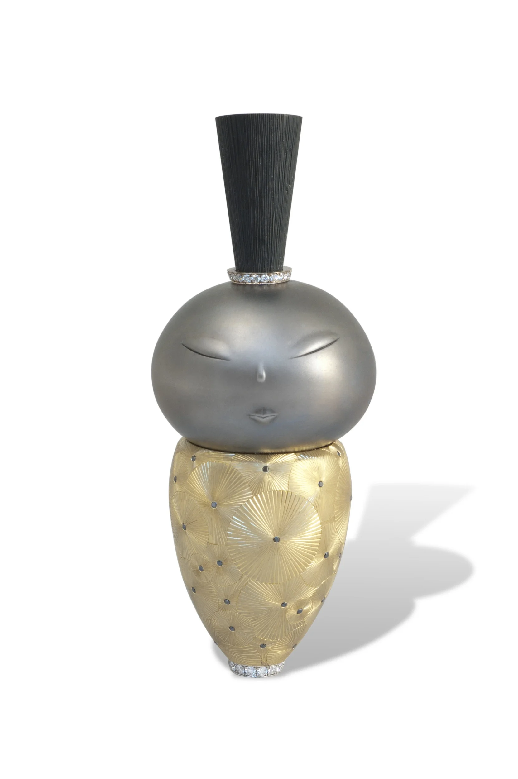 Kokeshi Basho, platinum carved face, 18 karat hand engraved body with flush set sapphires, carved black jade hair, diamond pave accents at base and hair