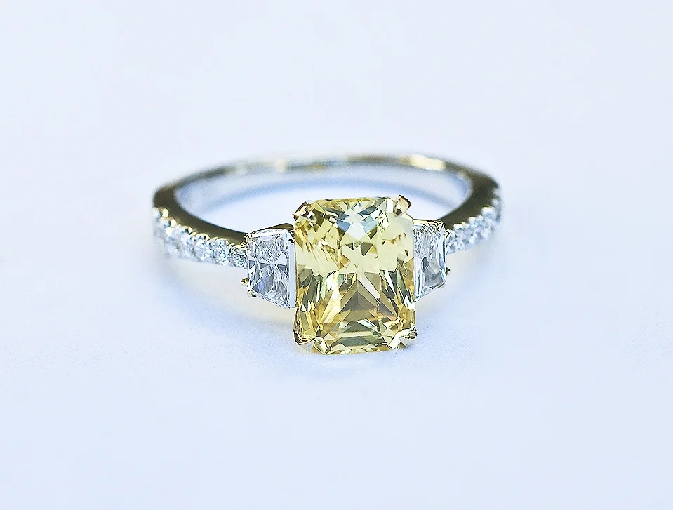 yellow sapphire, diamond, yellow gold and platinum engagement ring