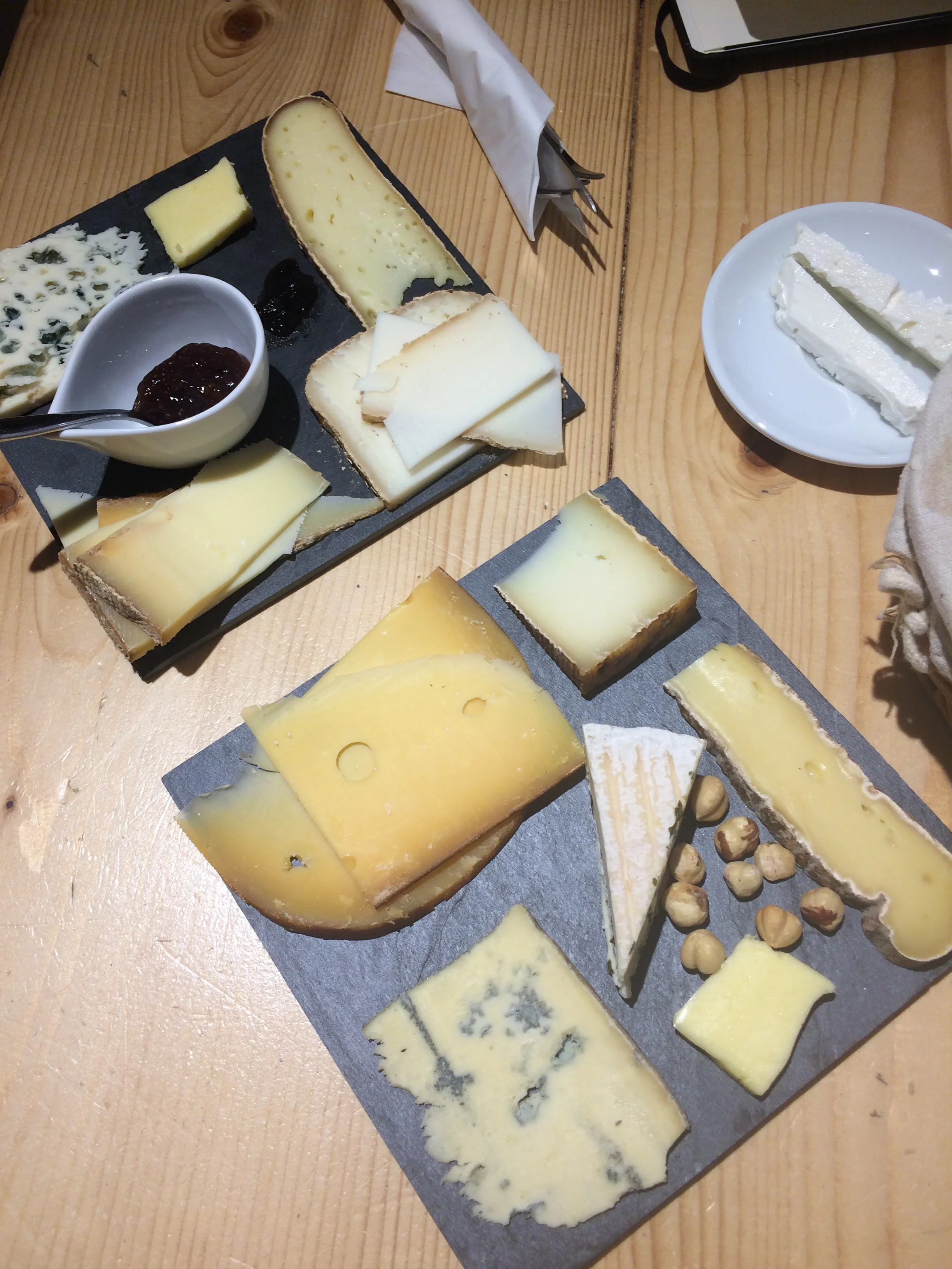Cheese tasting with 10 cheeses, fig jam, french butter and hazelnuts, baguette and wine! Yum.