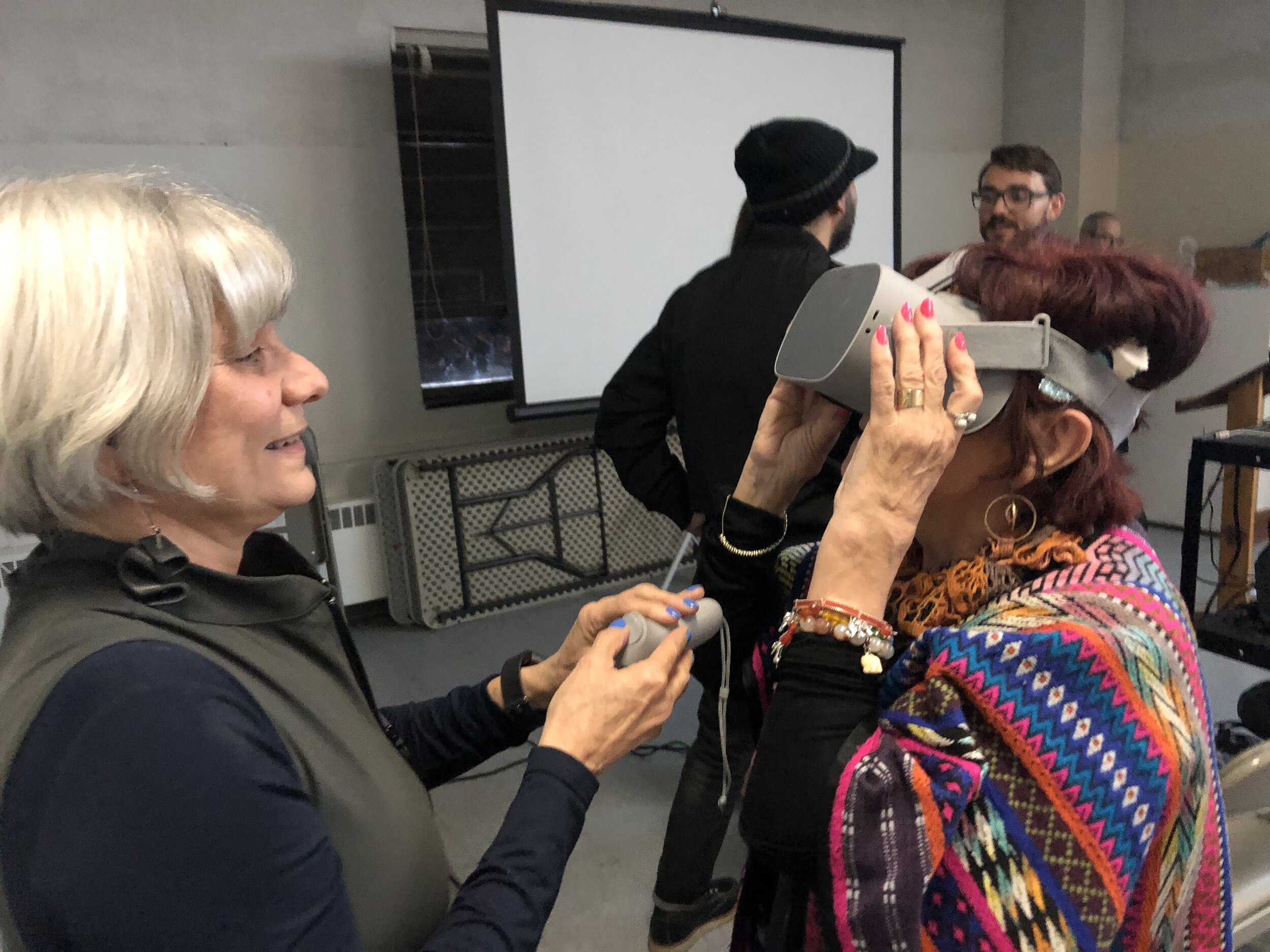  Pictured left is architect Miriam Gusevich with local resident Lucy Pearl experiencing the park through VR glasses. Lucy Pearl is of Polish and Russian decent, her father Mr. Gampel grew up just north of Samhir, Urkraine and escaped the Nazi occupat